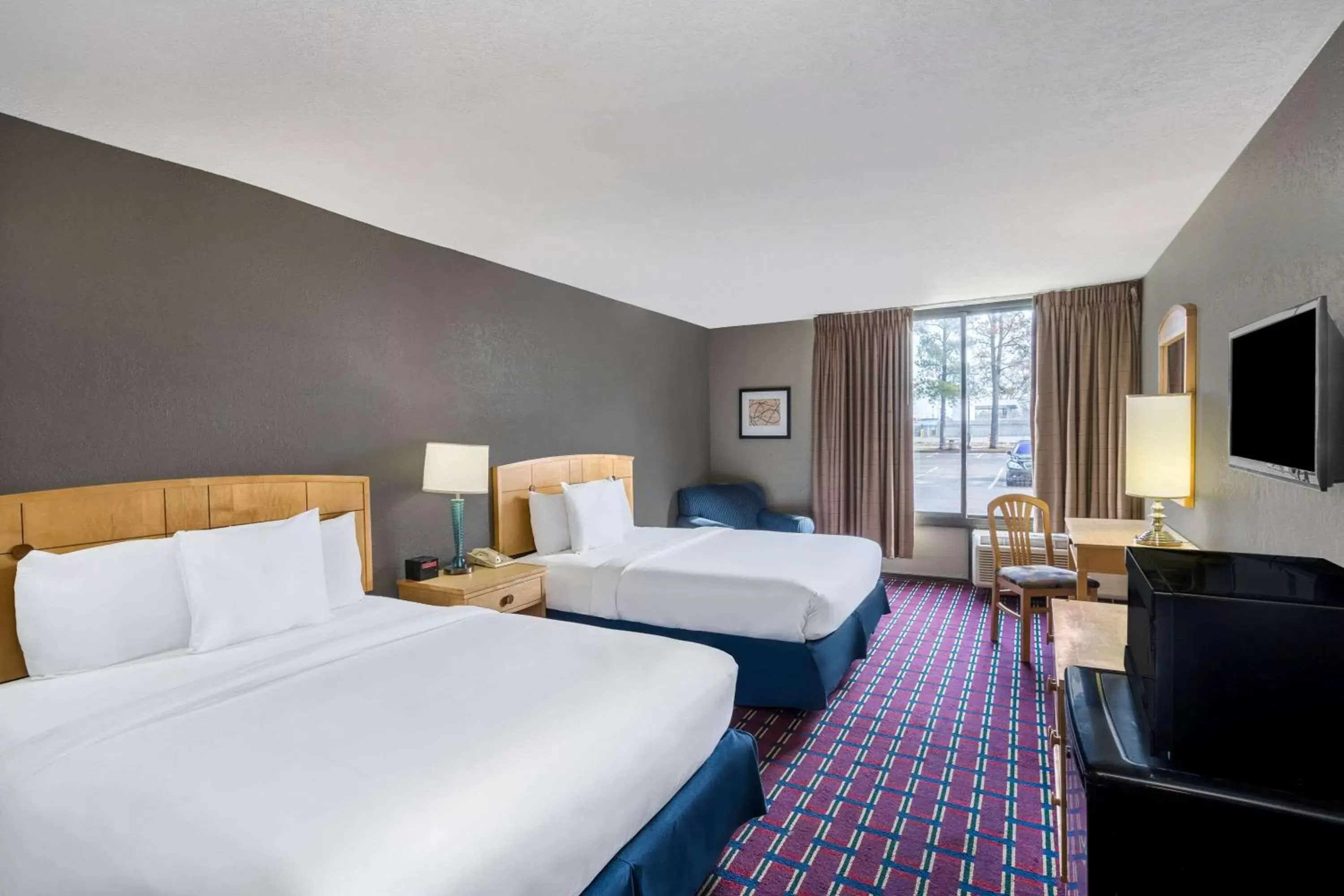 Photo of the whole room in Travelodge by Wyndham Memphis Airport/Graceland