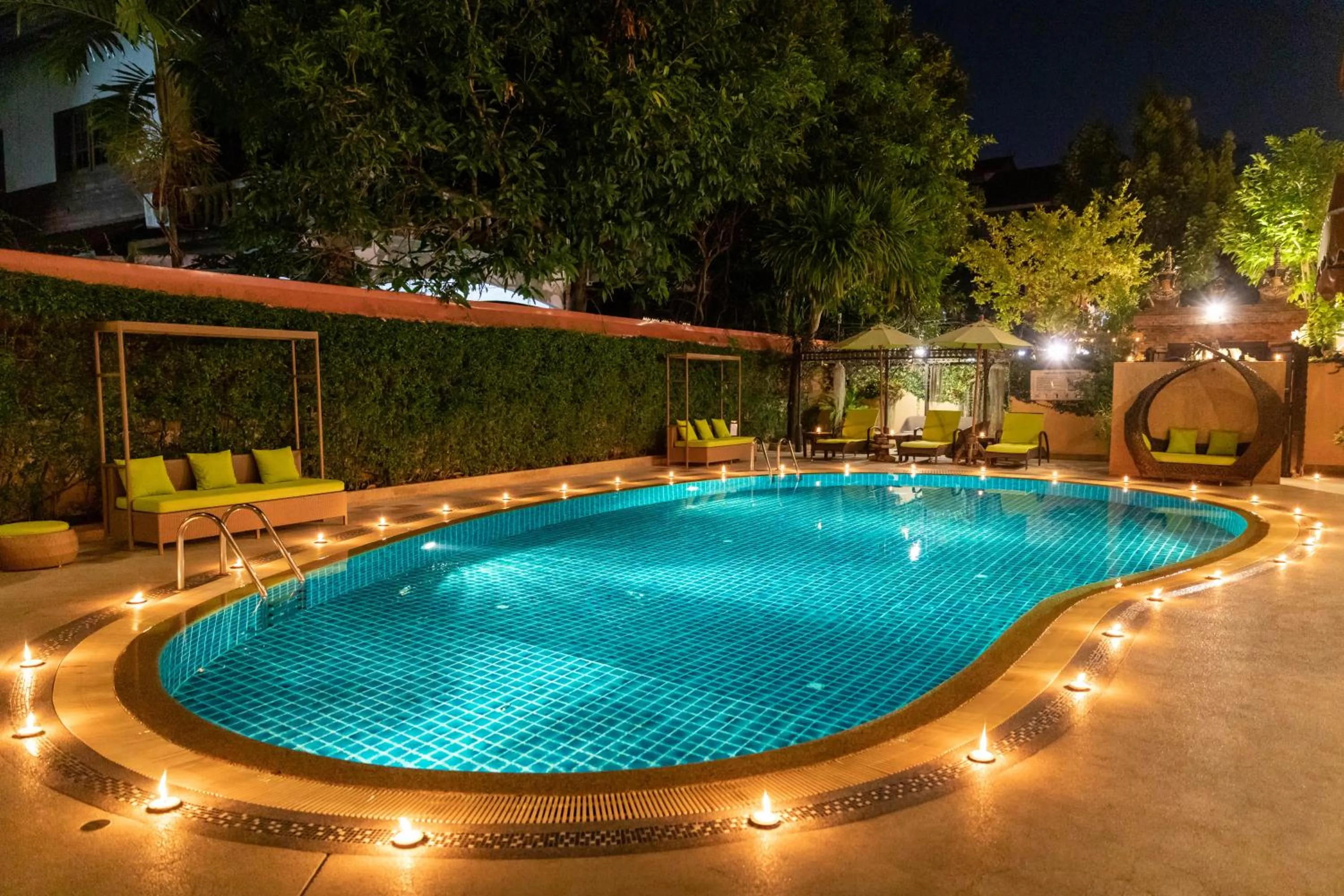 Swimming pool in At Chiang Mai Hotel