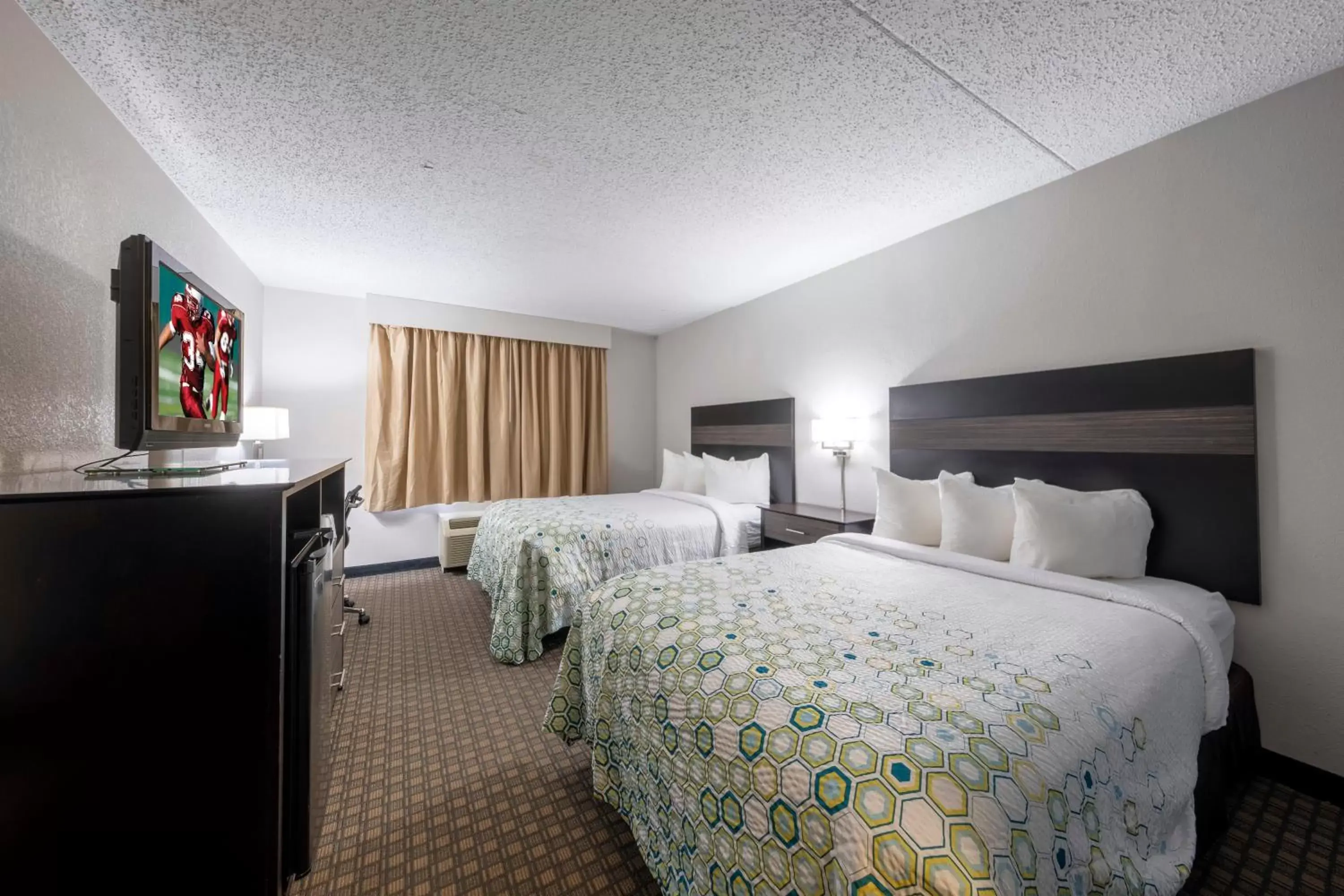 Standard Room with Two Double Beds with Microwave & Refrigerator Non-Smoking in HomeTown Inn by Red Roof East Syracuse Standard Room with Two Double Beds with Microwave & Refrigerator Non-Smoking in HomeTown Inn by Red Roof East Syracuse