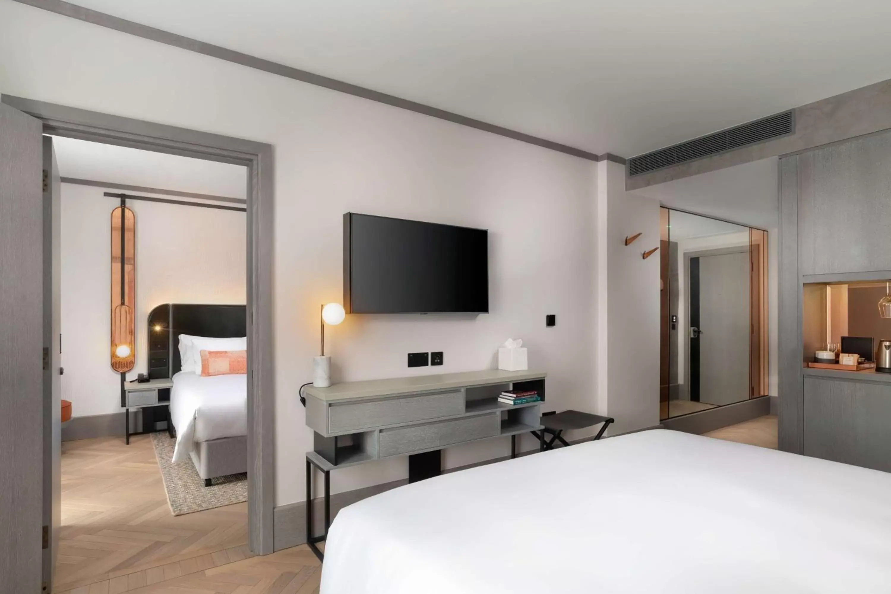 Bed, TV/Entertainment Center in Hart Shoreditch Hotel London, Curio Collection by Hilton