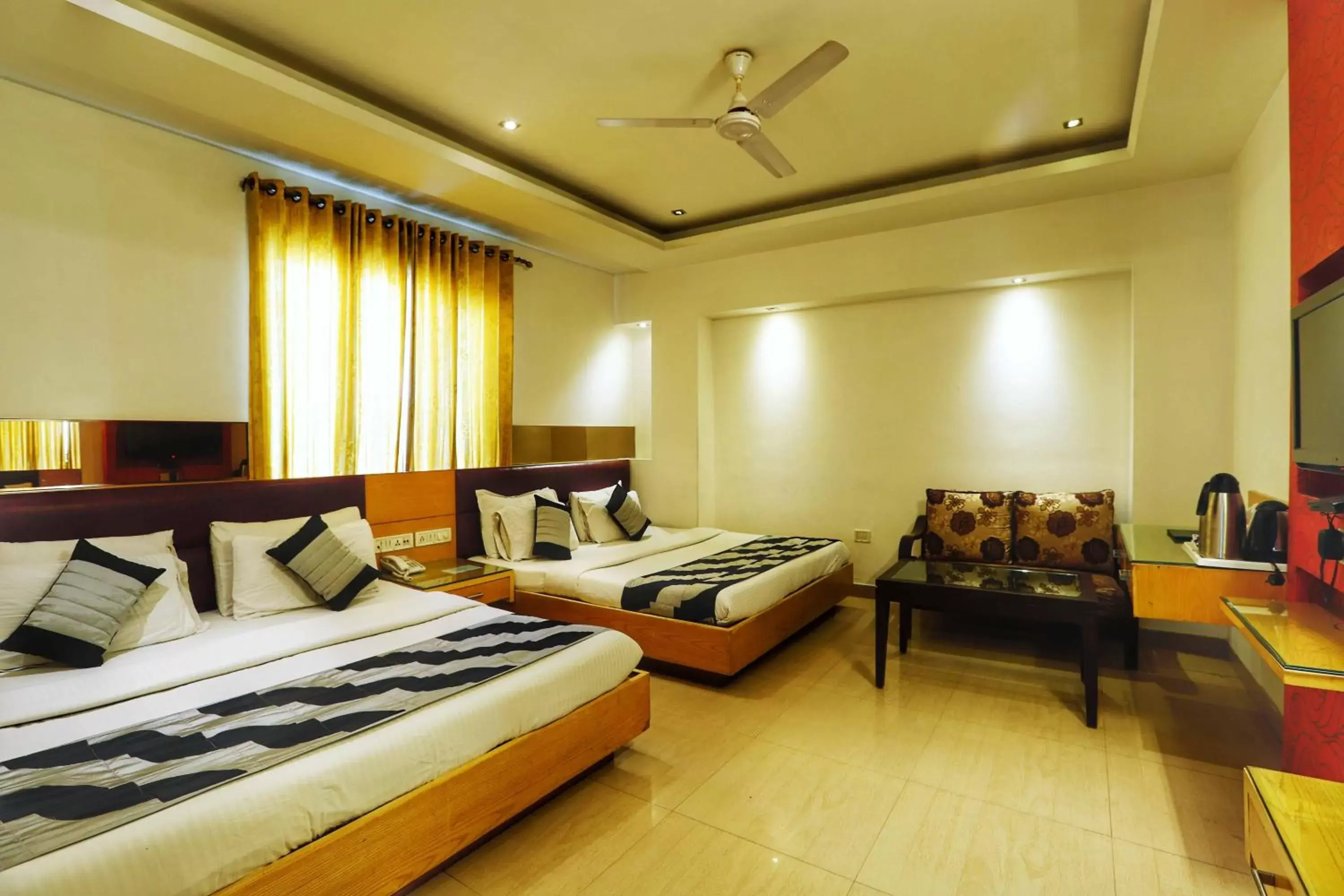 Photo of the whole room, Bed in Hotel Krishna - By RCG Hotels