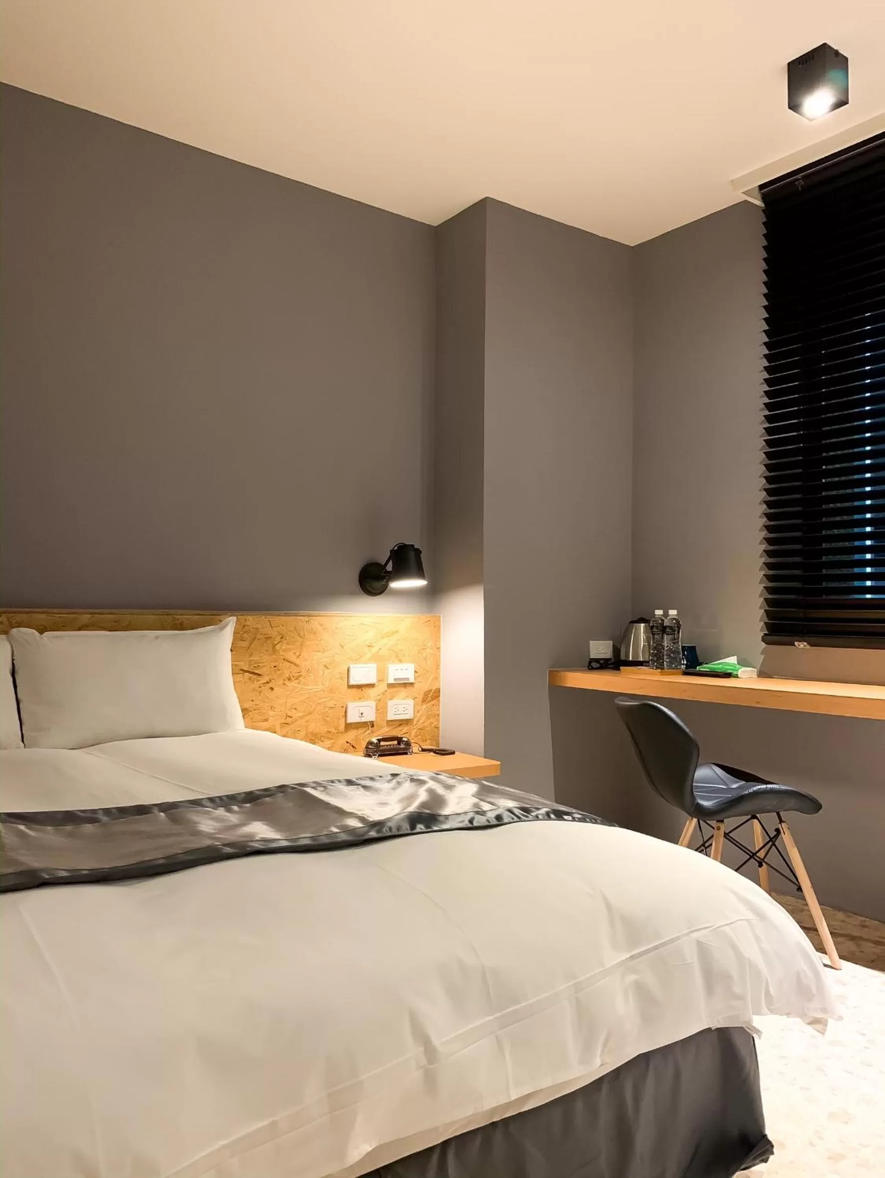 Bed in Raise Hotel Taichung