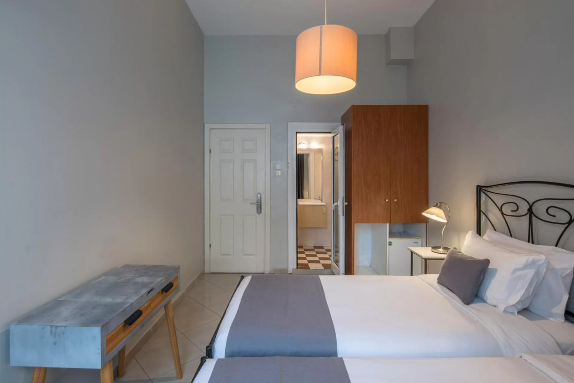 Bed in Kimon Hotel Athens