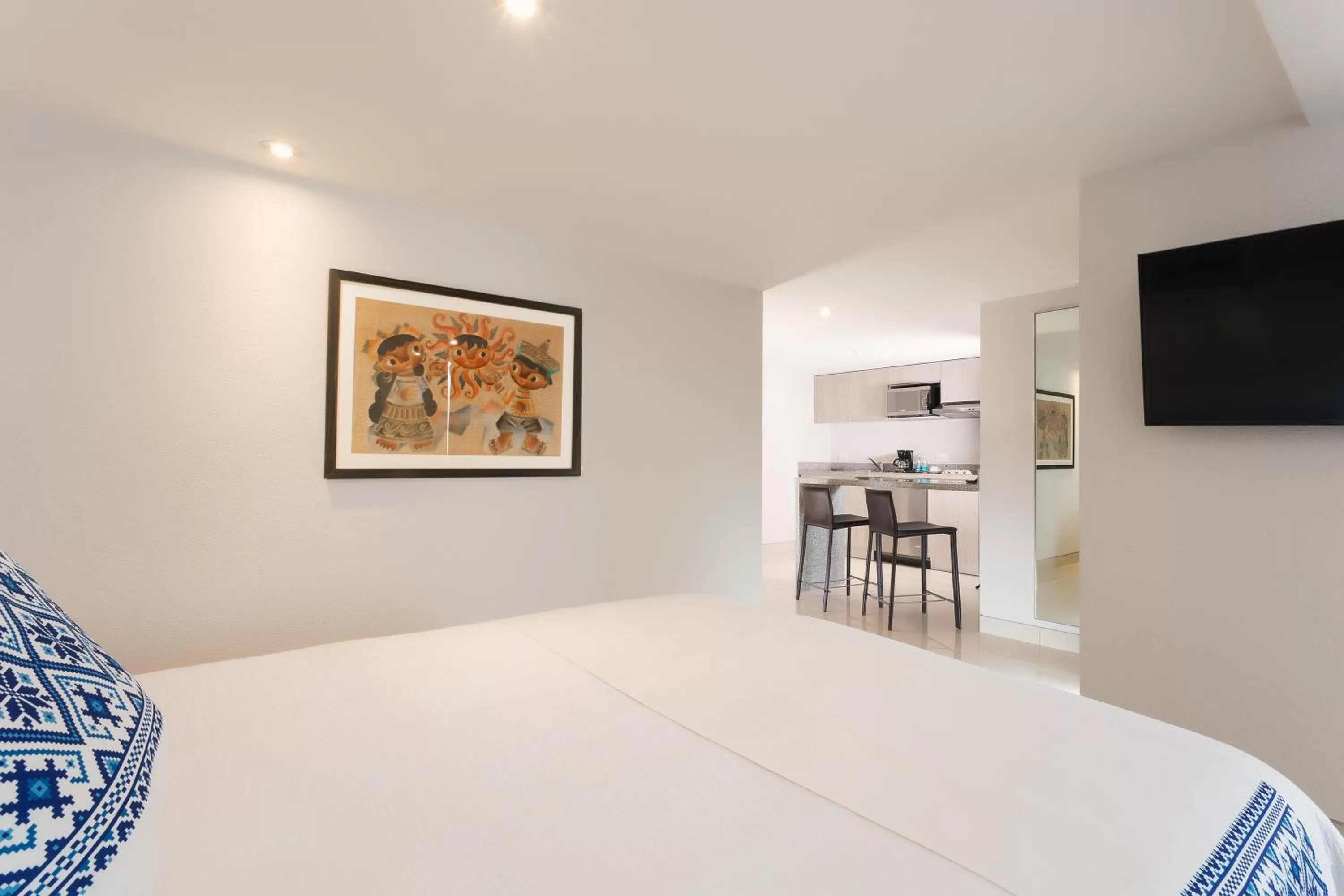 Photo of the whole room, Bed in Hotel Indigo Guadalajara Expo by IHG