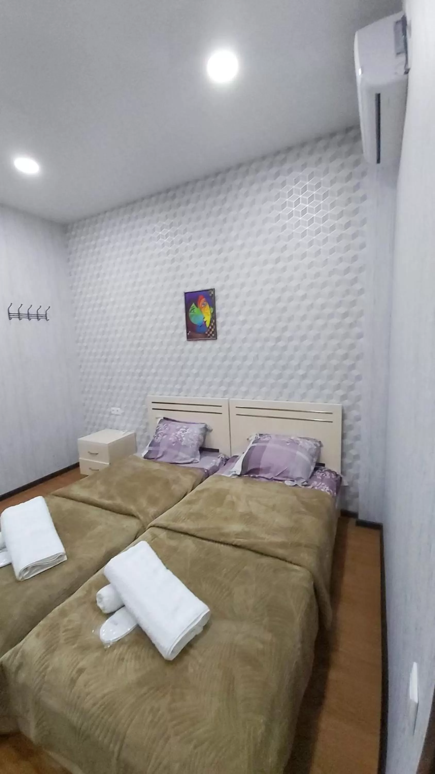 Bed in Gamarjoba Hotel