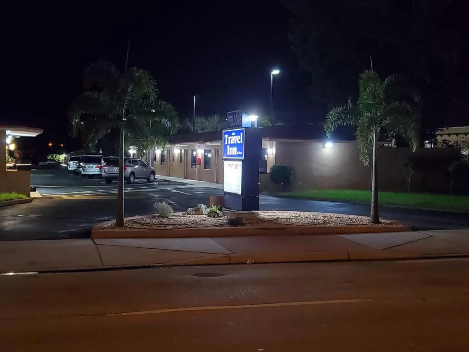 Property logo or sign in Travel Inn of Riviera Beach