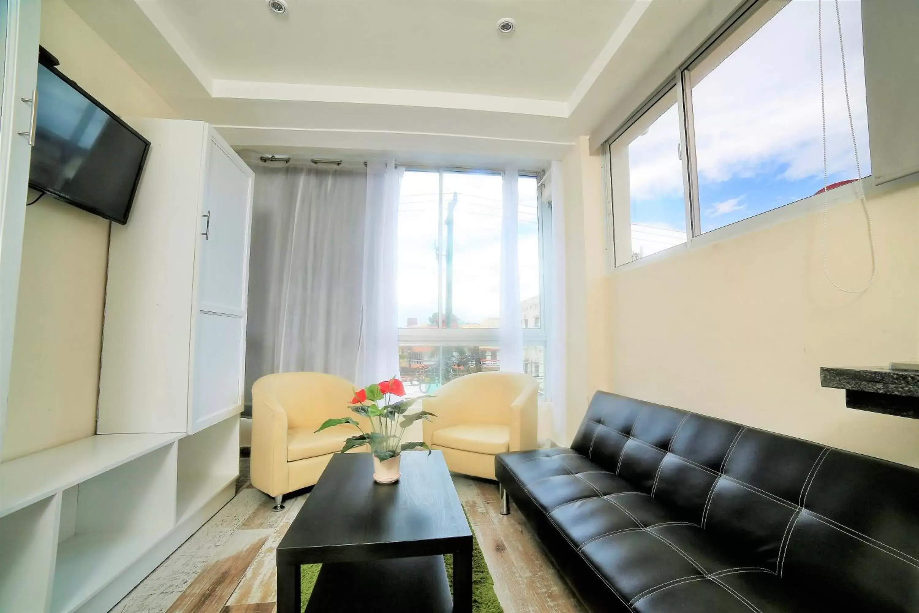 Living room, Seating Area in RIG Puerto Malecón