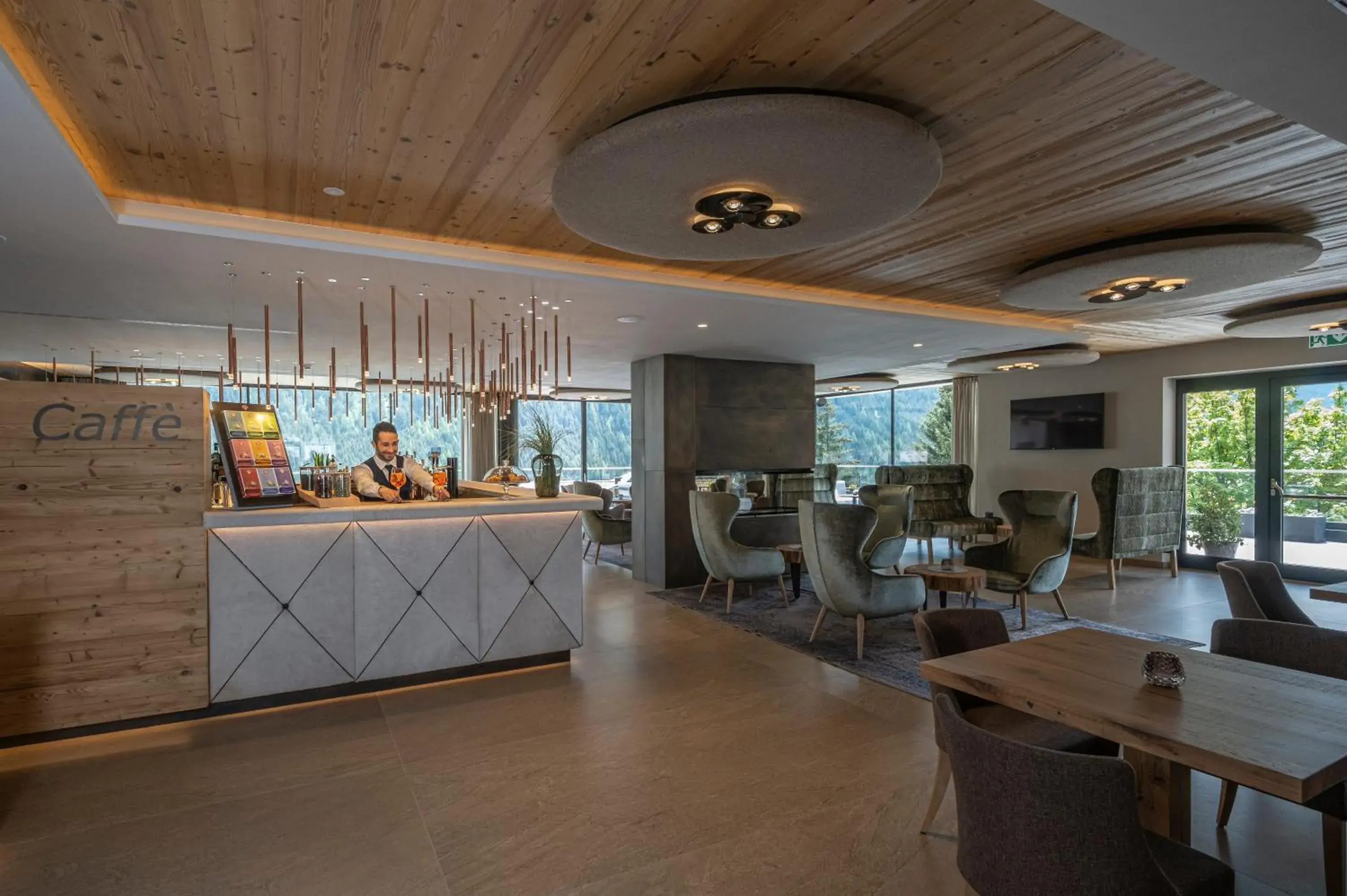Lounge or bar in Ciampedie Luxury Alpine Spa Hotel