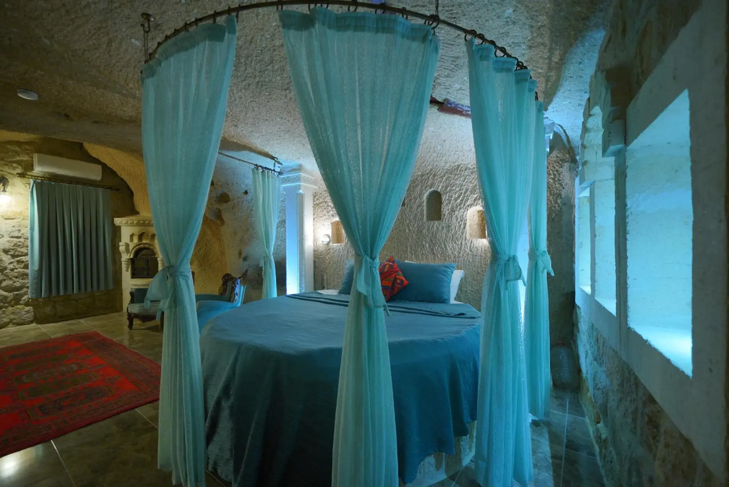 Bed in Holiday Cave Hotel