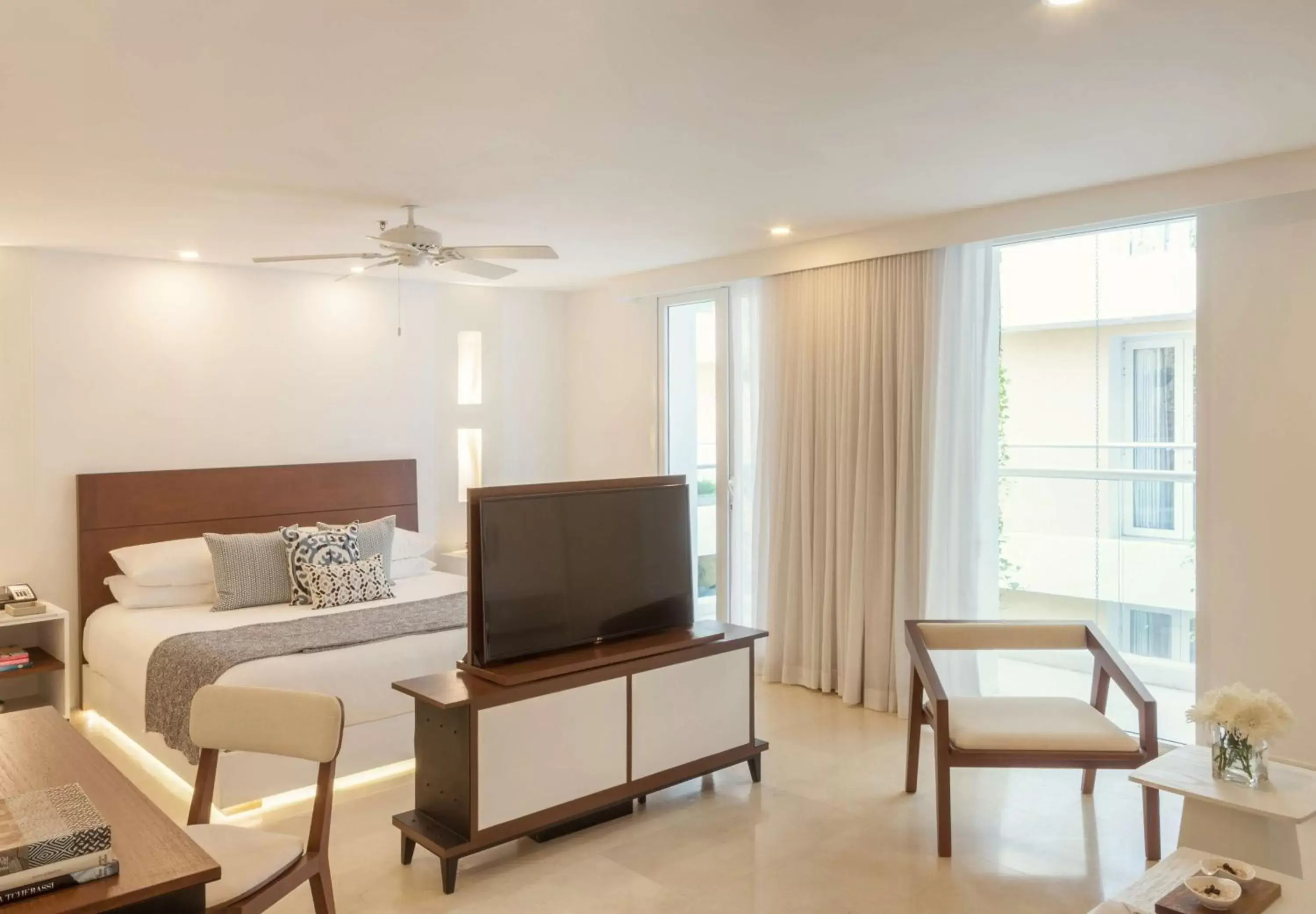 Bed, TV/Entertainment Center in Nacar Hotel Cartagena, Curio Collection by Hilton