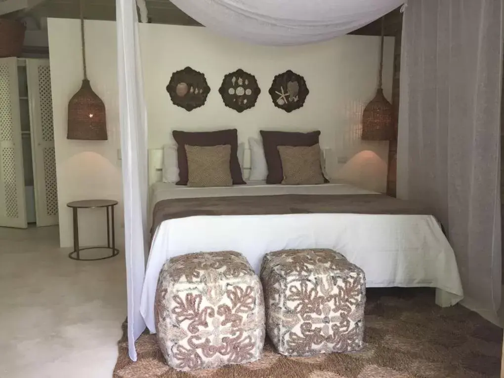 Bed in Mahona Boutique Hotel