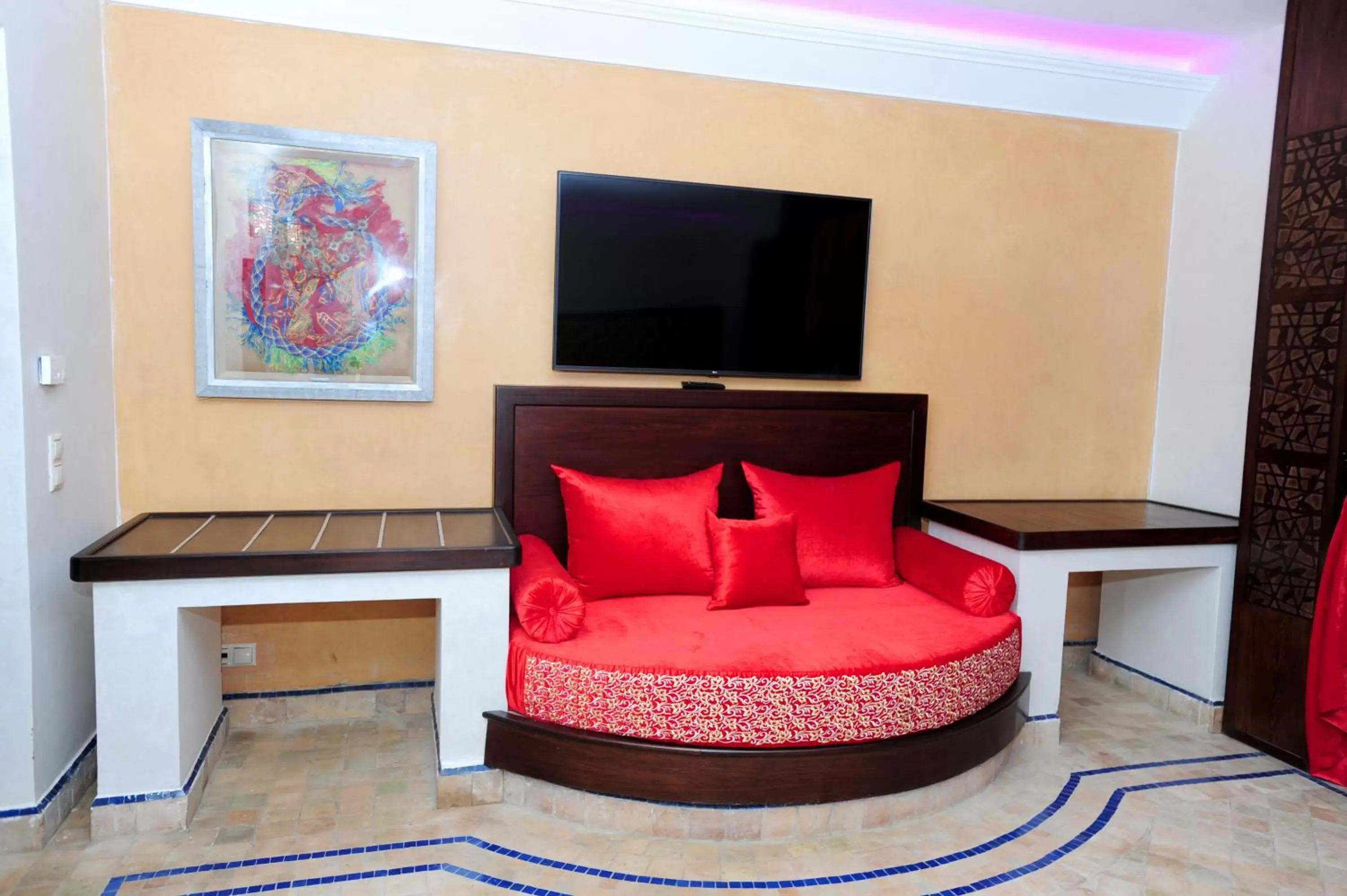 TV/Entertainment Center in Hotel Prestige Agadir Boutique & SPA