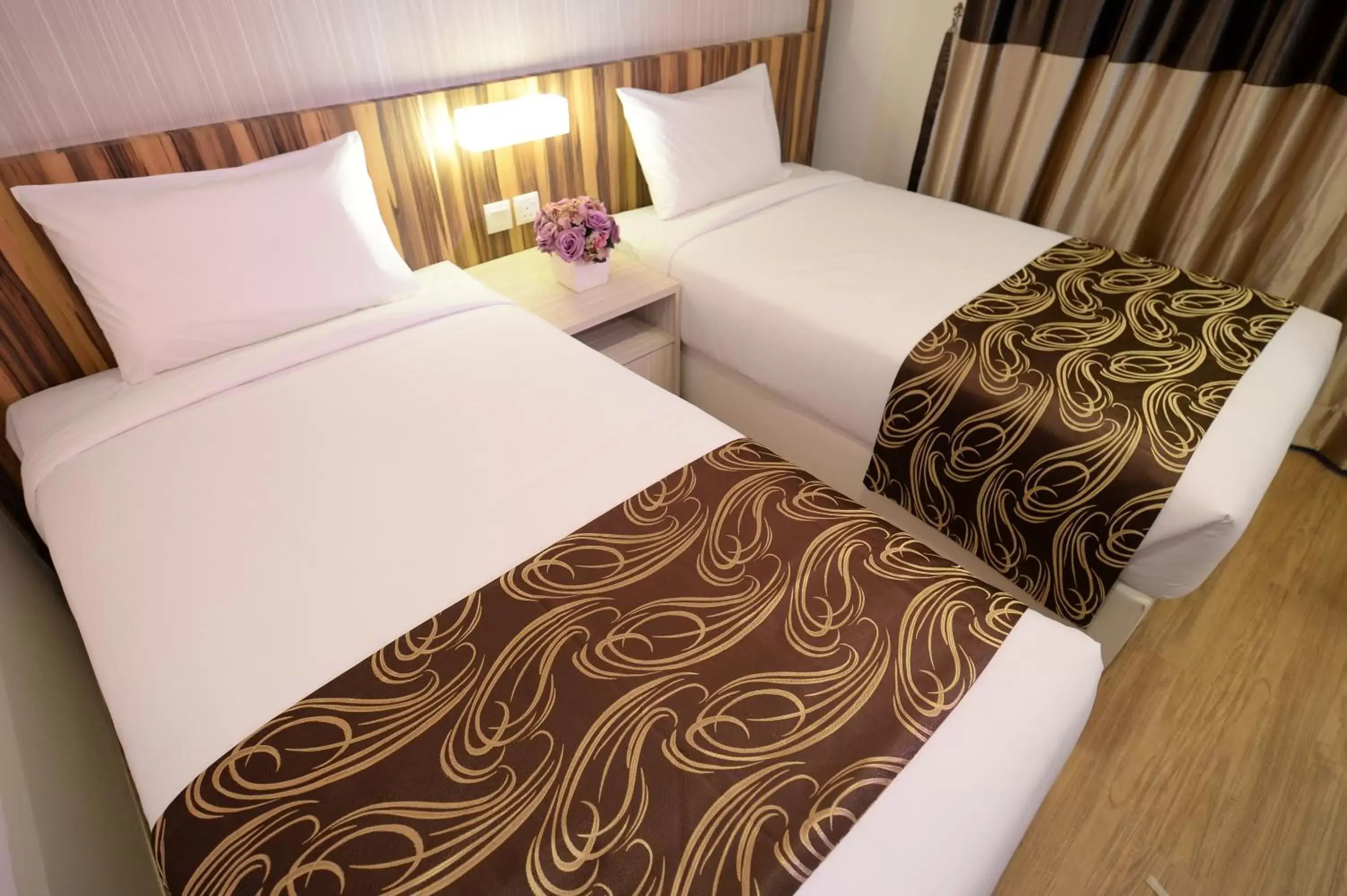 Bed in Rimba Hotel