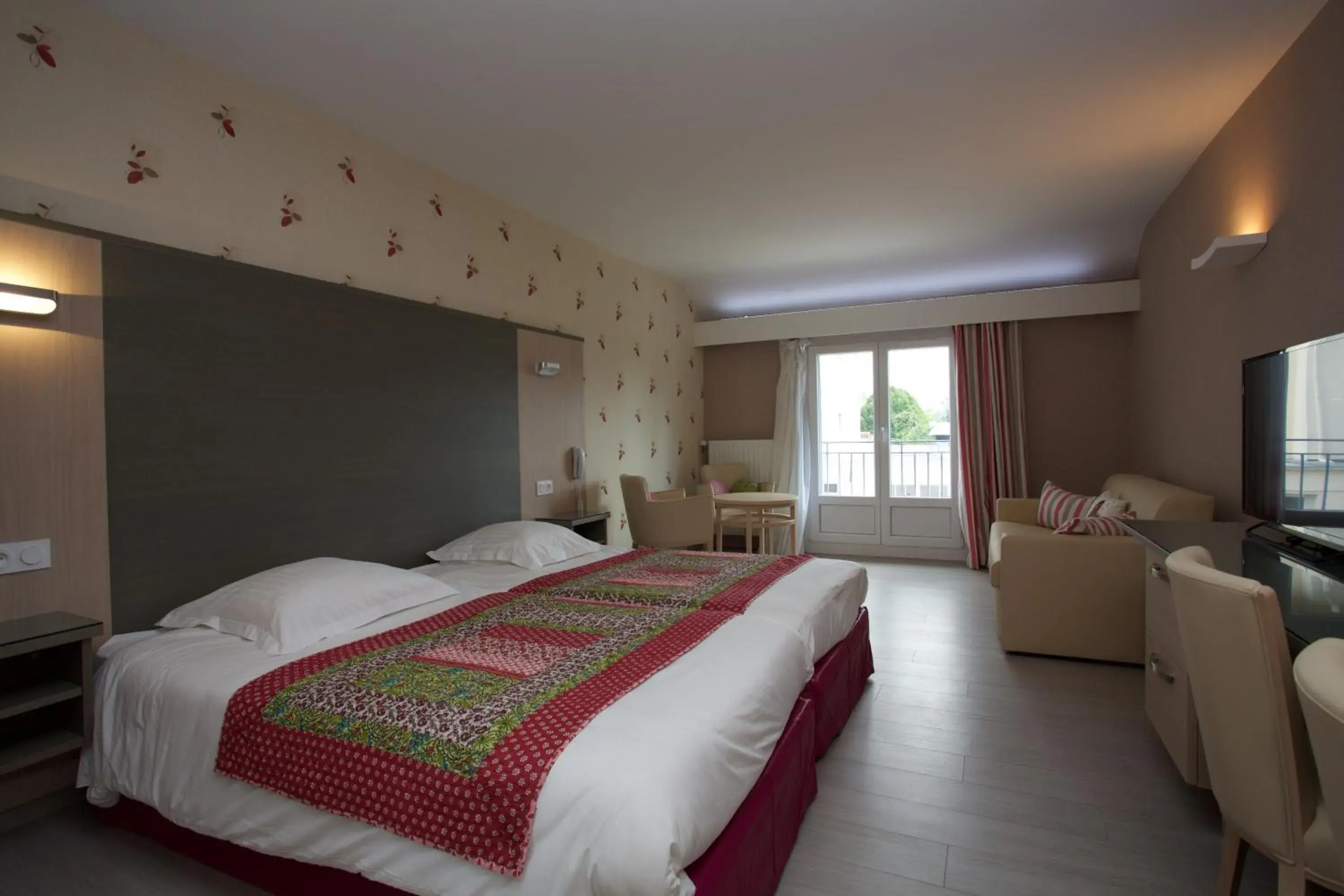 Bed in Logis Hotel Restaurant Spa Beau Site Bed in Logis Hotel Restaurant Spa Beau Site