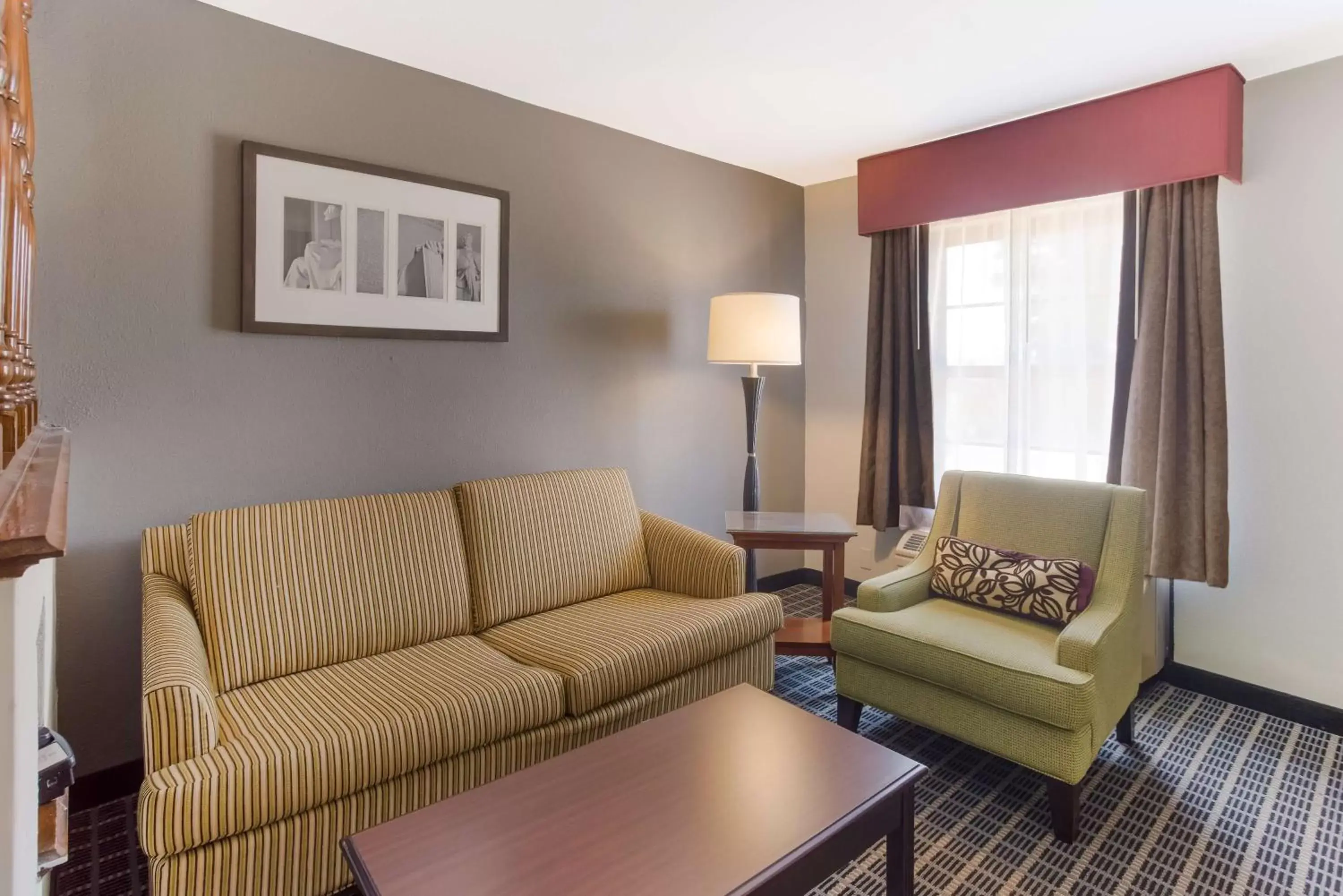 Photo of the whole room, Seating Area in SureStay Plus Hotel by Best Western Greenwood