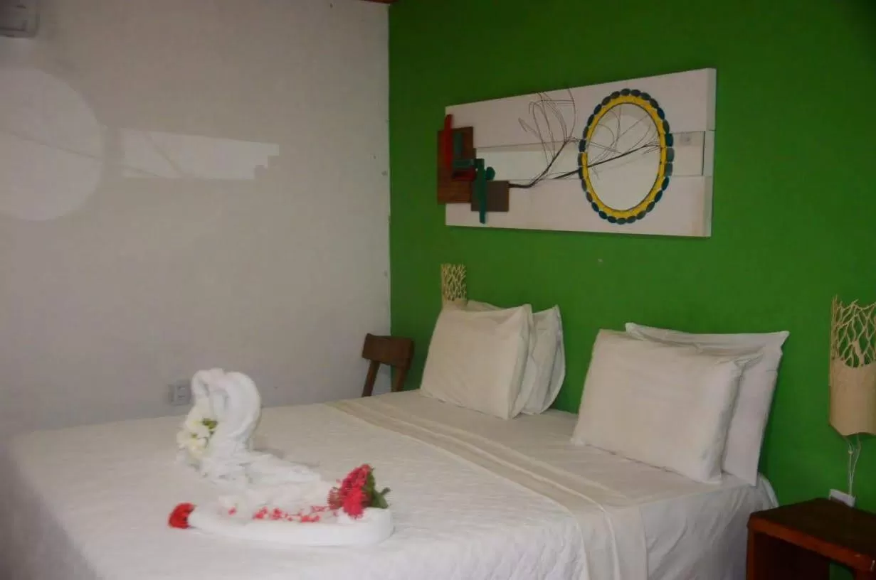 Bed in Pousada e Restaurante Encanto das Águas