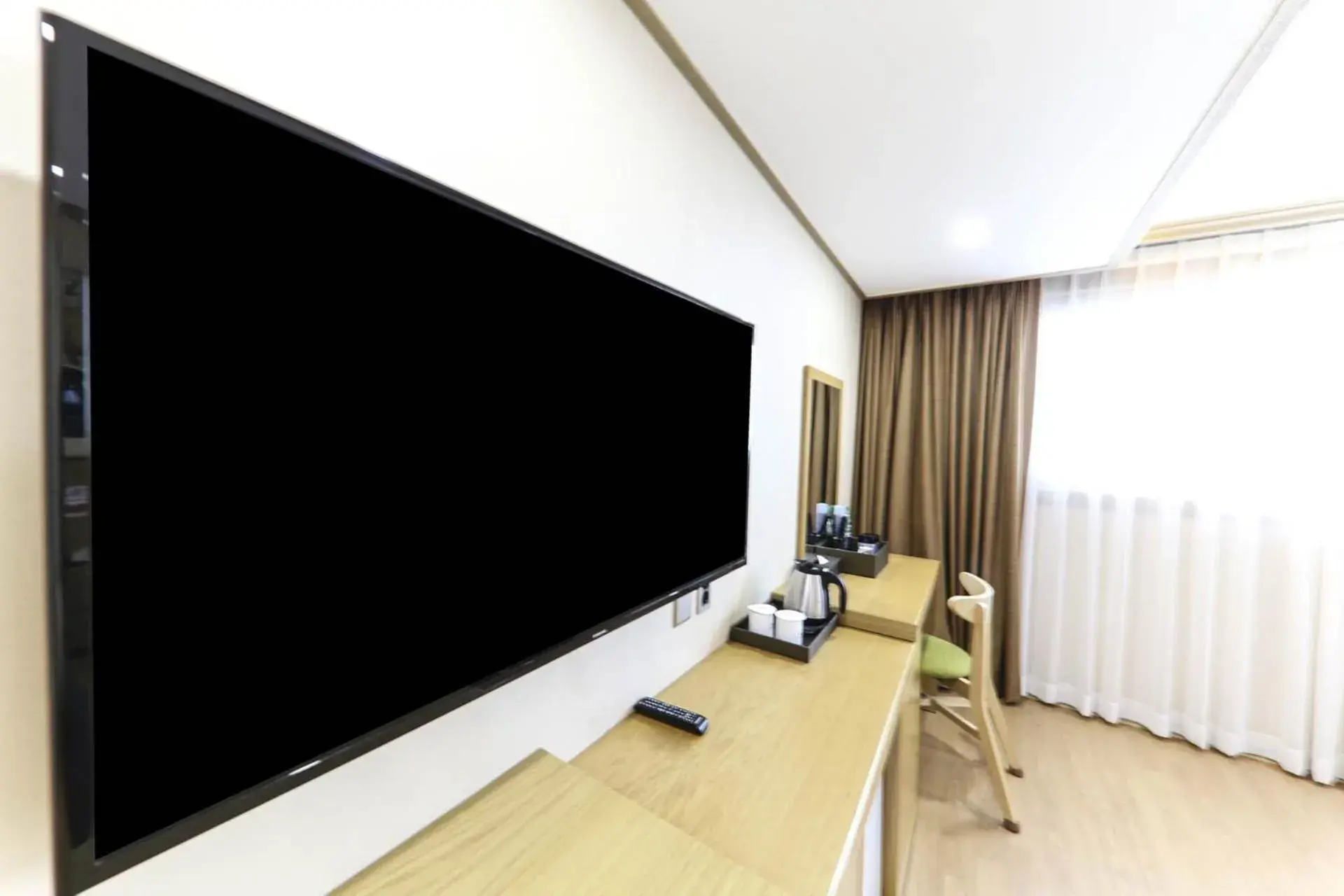 TV and multimedia, TV/Entertainment Center in Nohyung Hotel