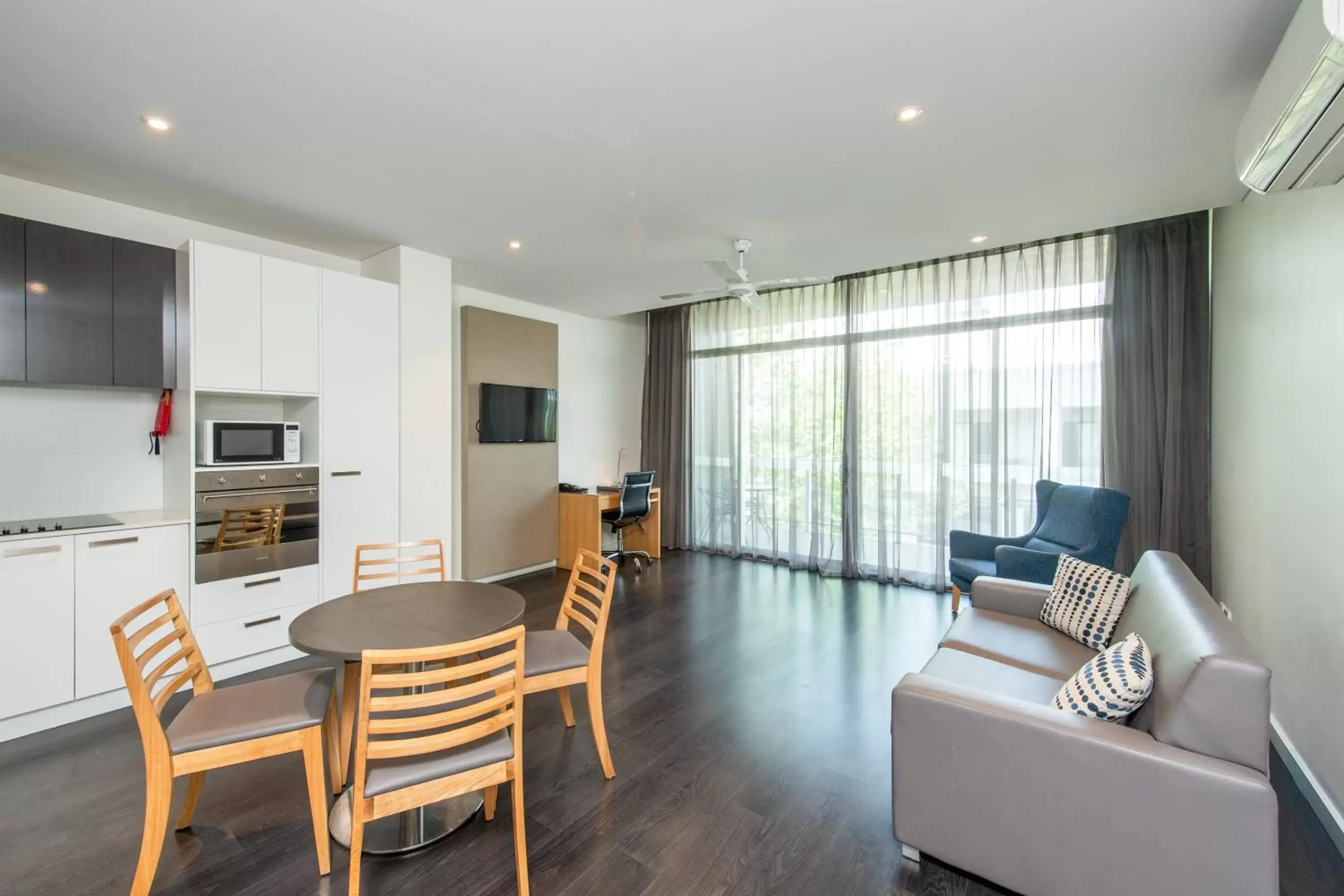 Living room, Dining Area in Mawson Lakes Hotel