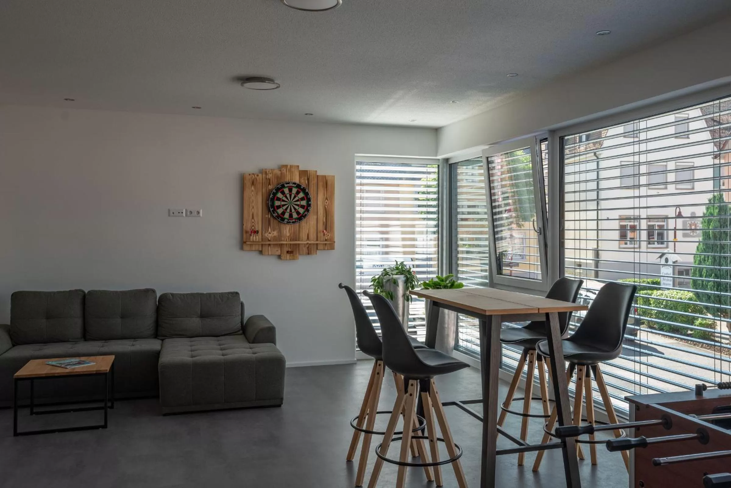 Communal lounge/ TV room in Gasthof Hosbein