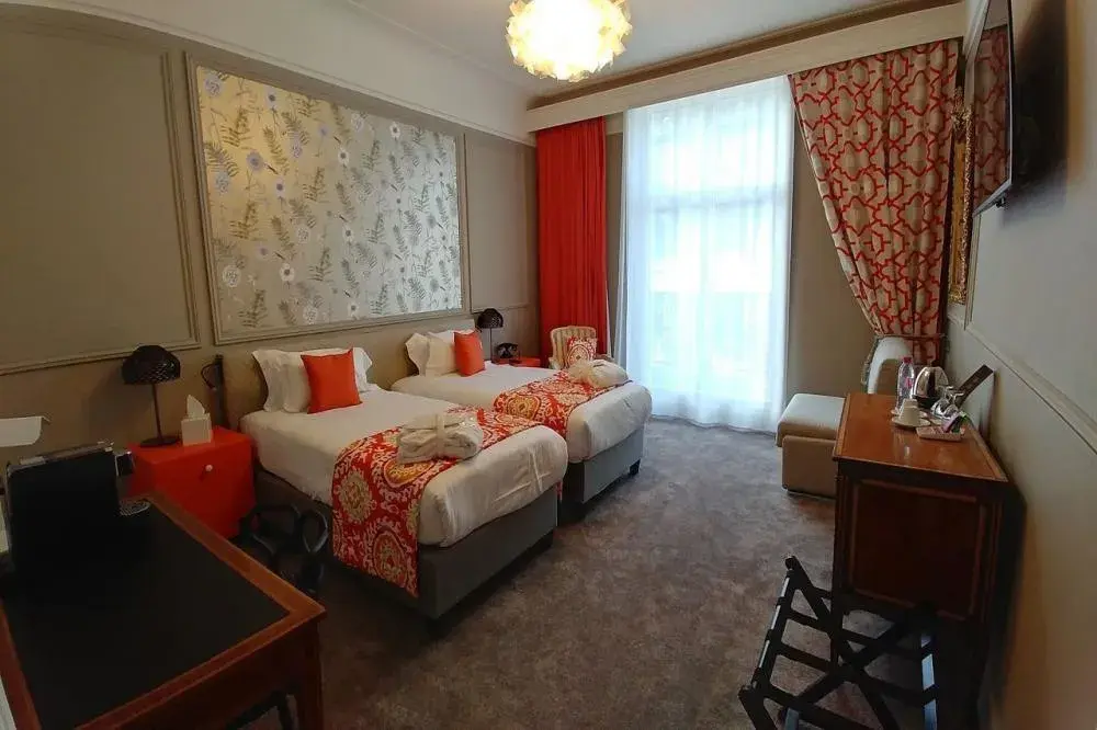 Photo of the whole room, Bed in Grand Hotel Bellevue - Grand Place