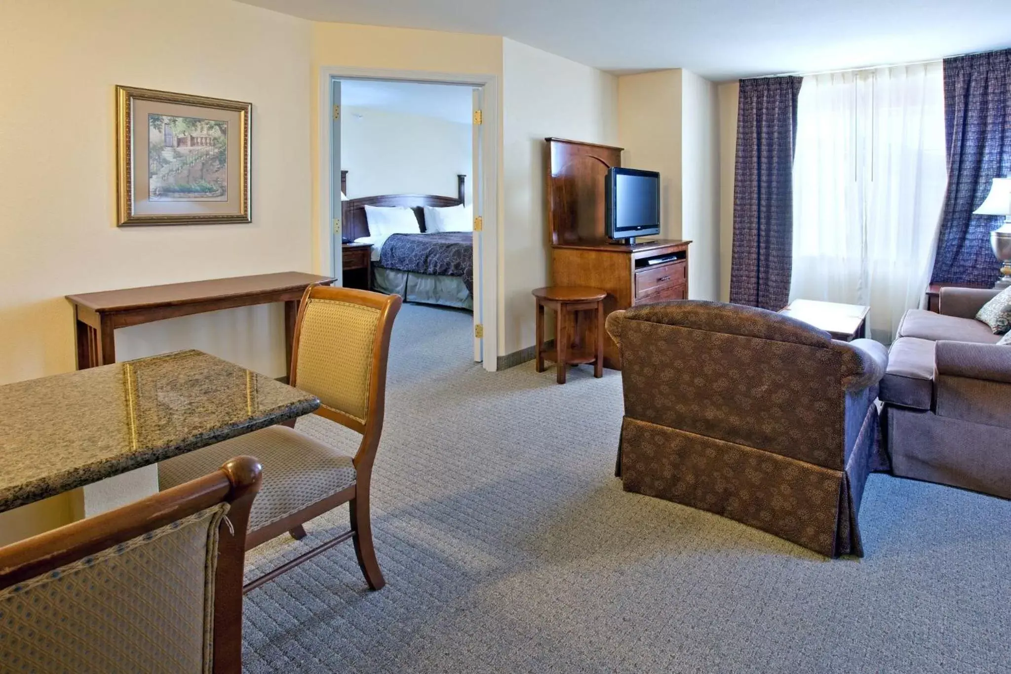 Photo of the whole room, Seating Area in Staybridge Suites - Albuquerque Airport, an IHG Hotel