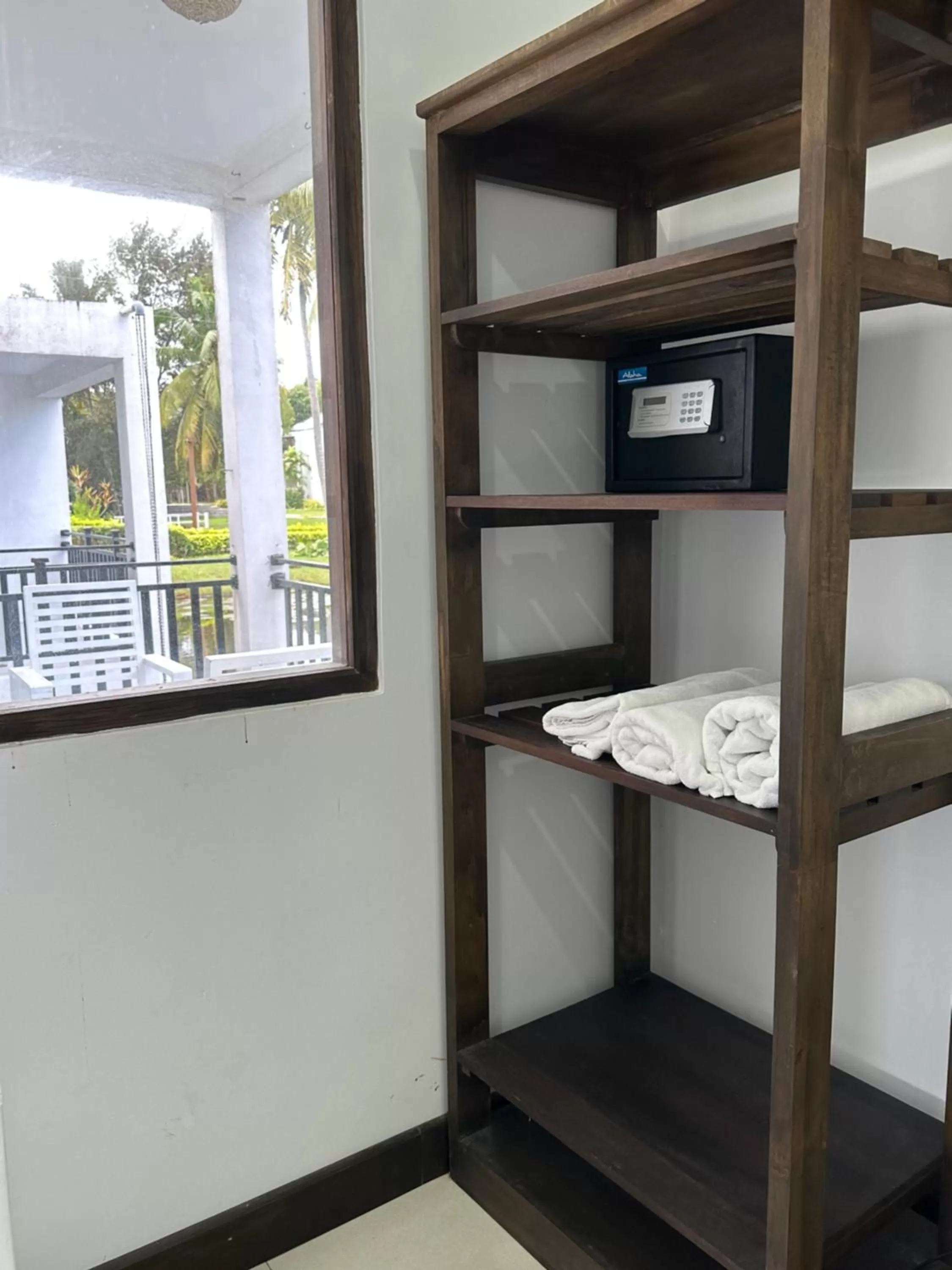 towels, Bed in Amaluna Resorts