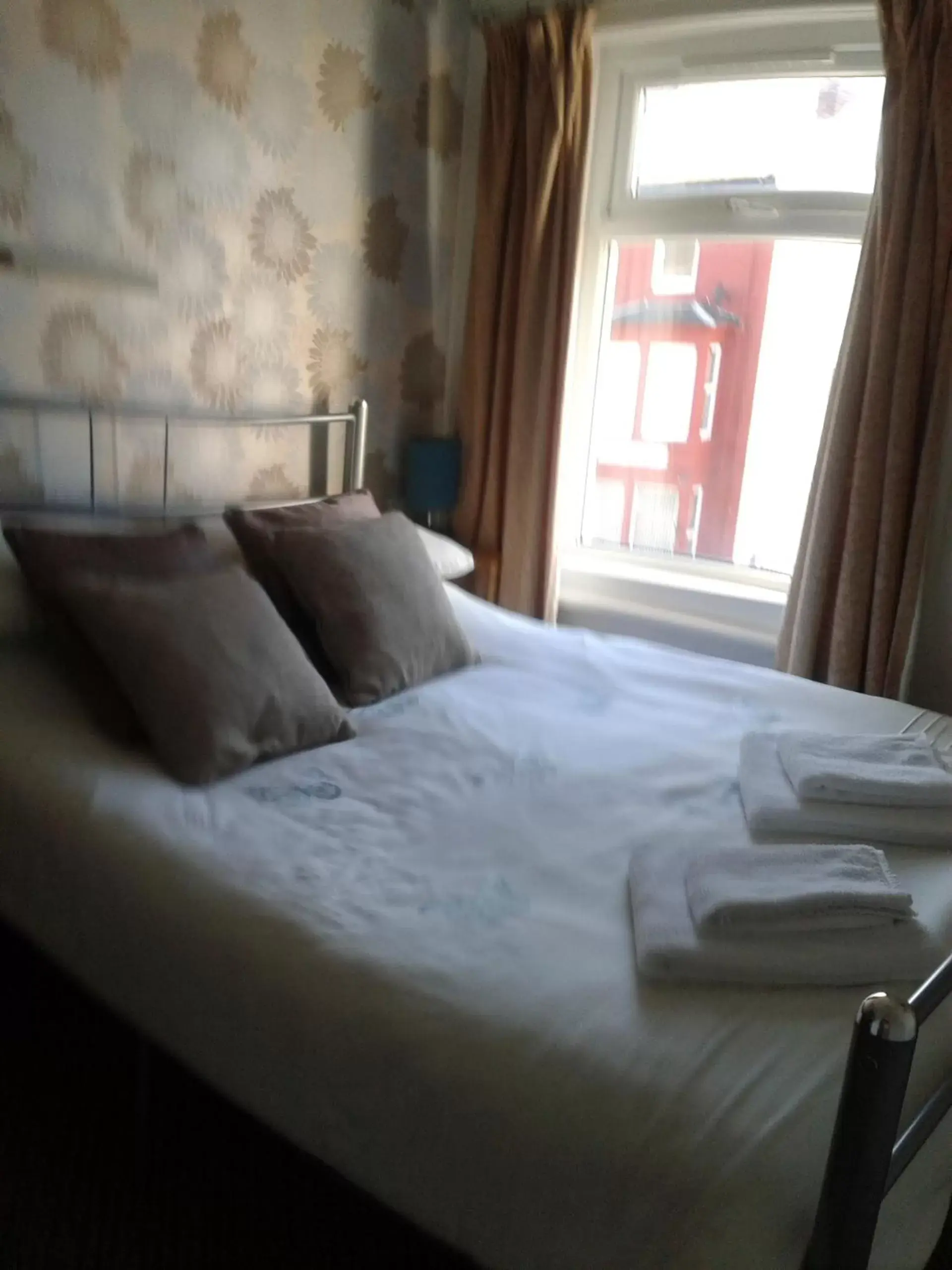 Bed in Legends Hotel