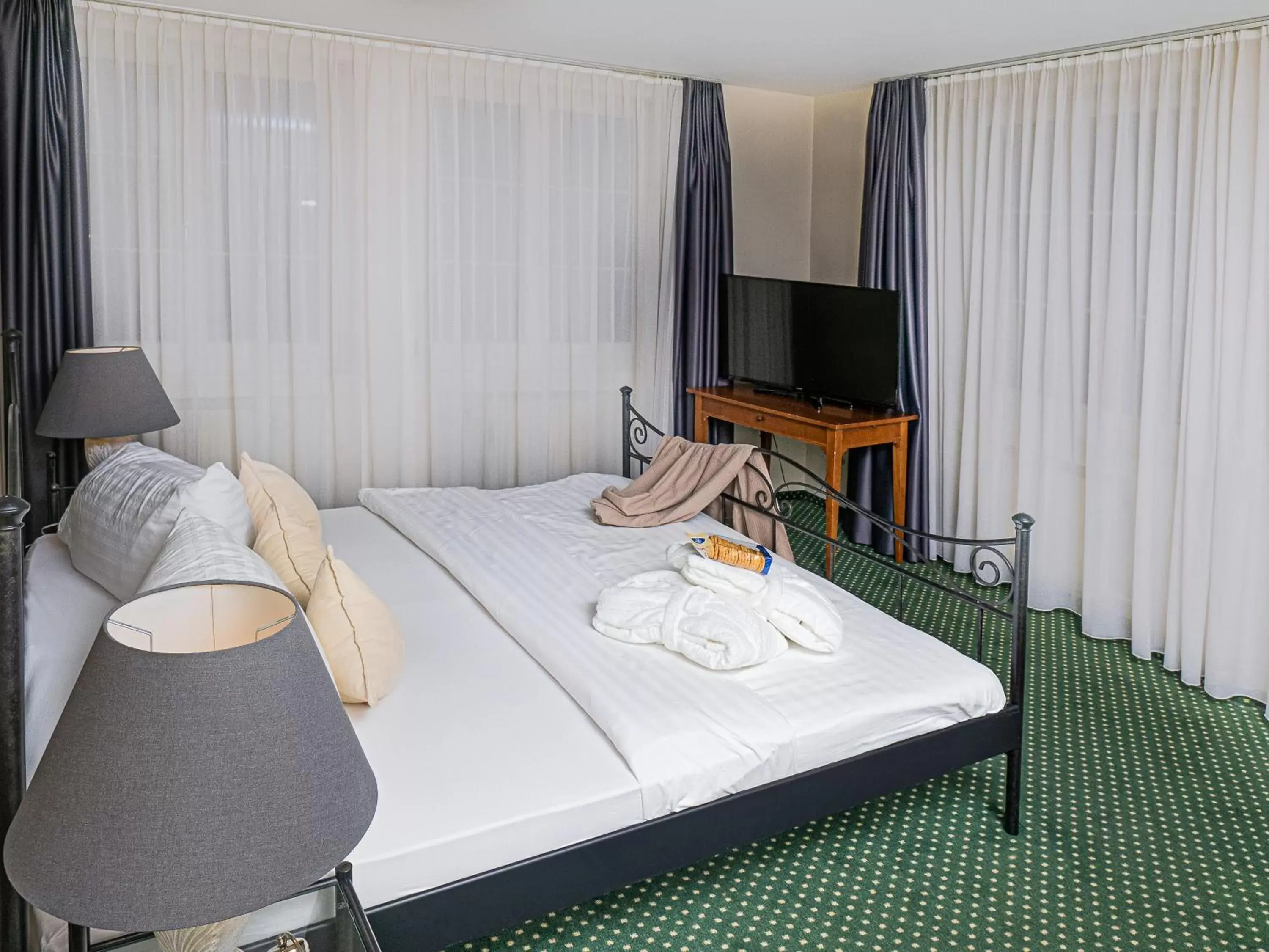 Bed in Hotel Rhyhof