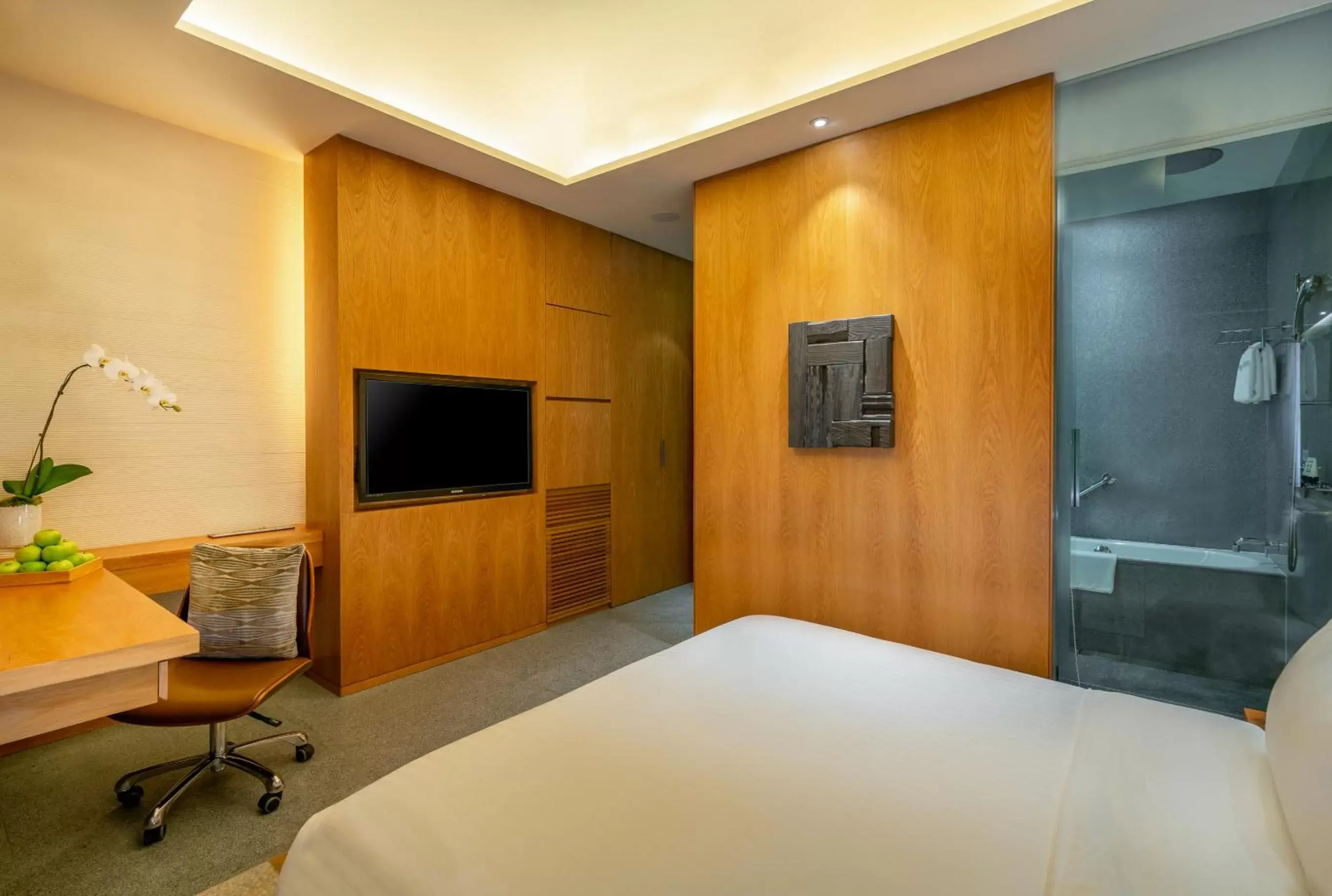 Bedroom, TV/Entertainment Center in Oasia Hotel Novena, Singapore by Far East Hospitality