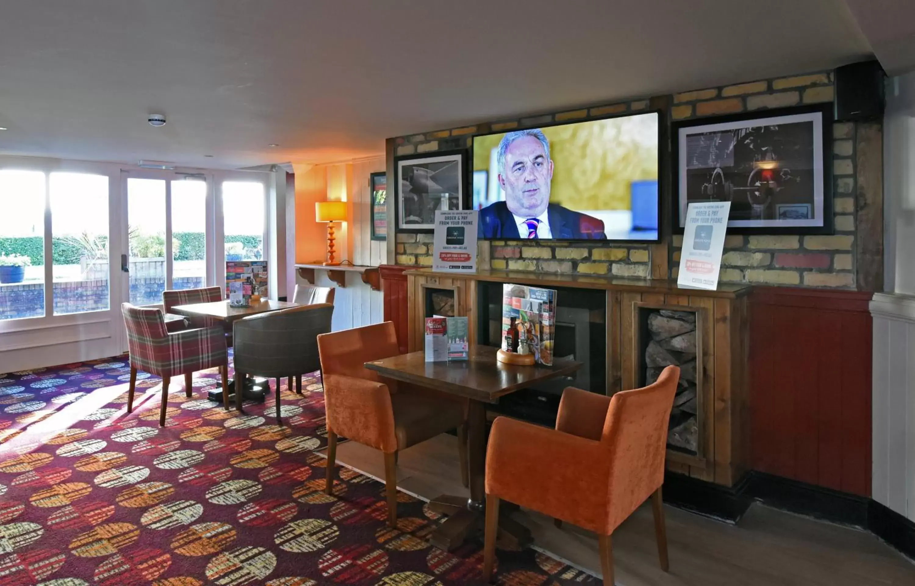 Seating area in Lea Gate by Greene King Inns