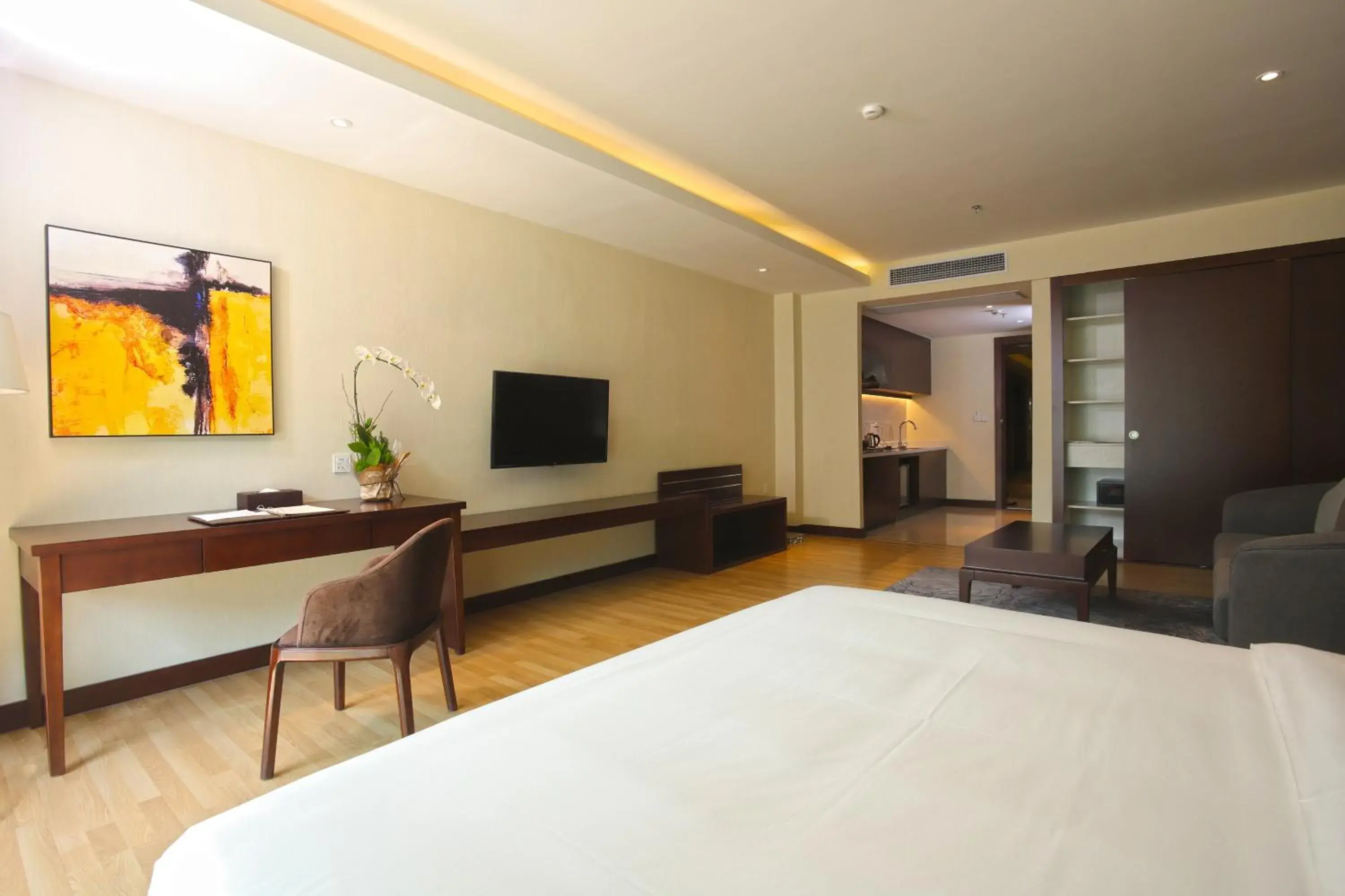 Bed, TV/Entertainment Center in Olympia City Hotel by Dara