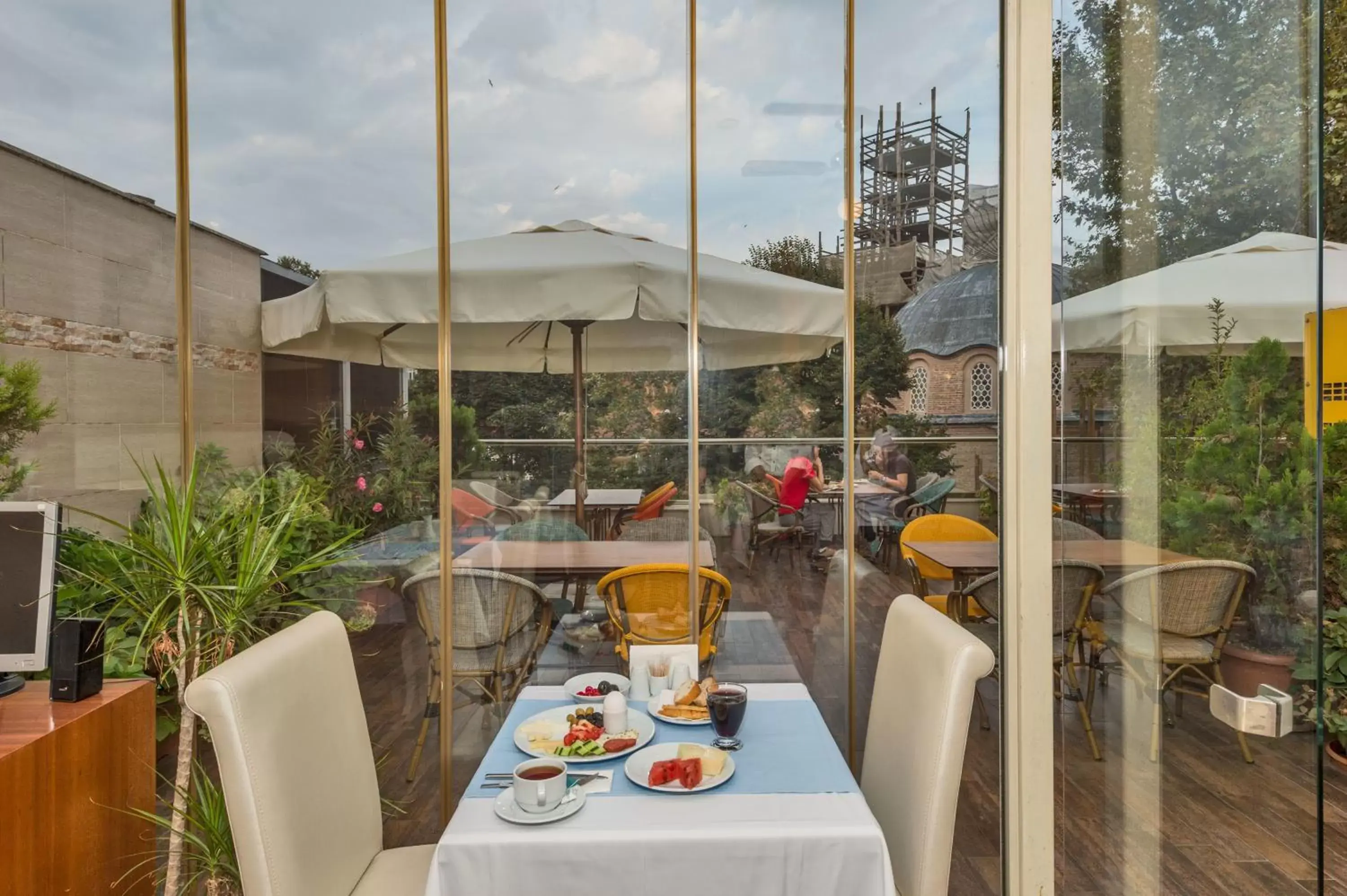 Balcony/Terrace, Restaurant/Places to Eat in The Empress Theodora Hotel