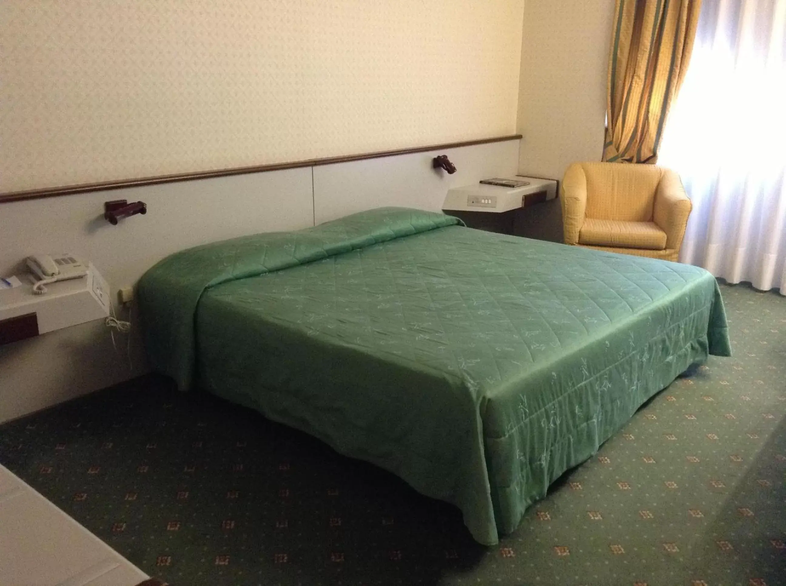 Bed in Hotel Maxim