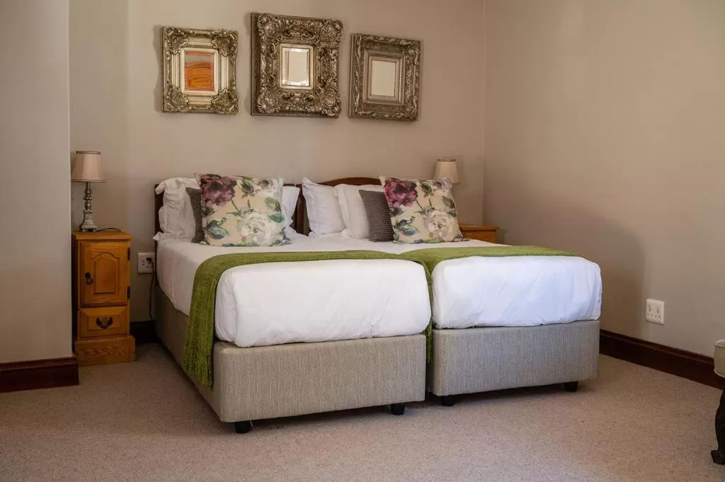 Bed in Issaquena Heights Boutique Hotel