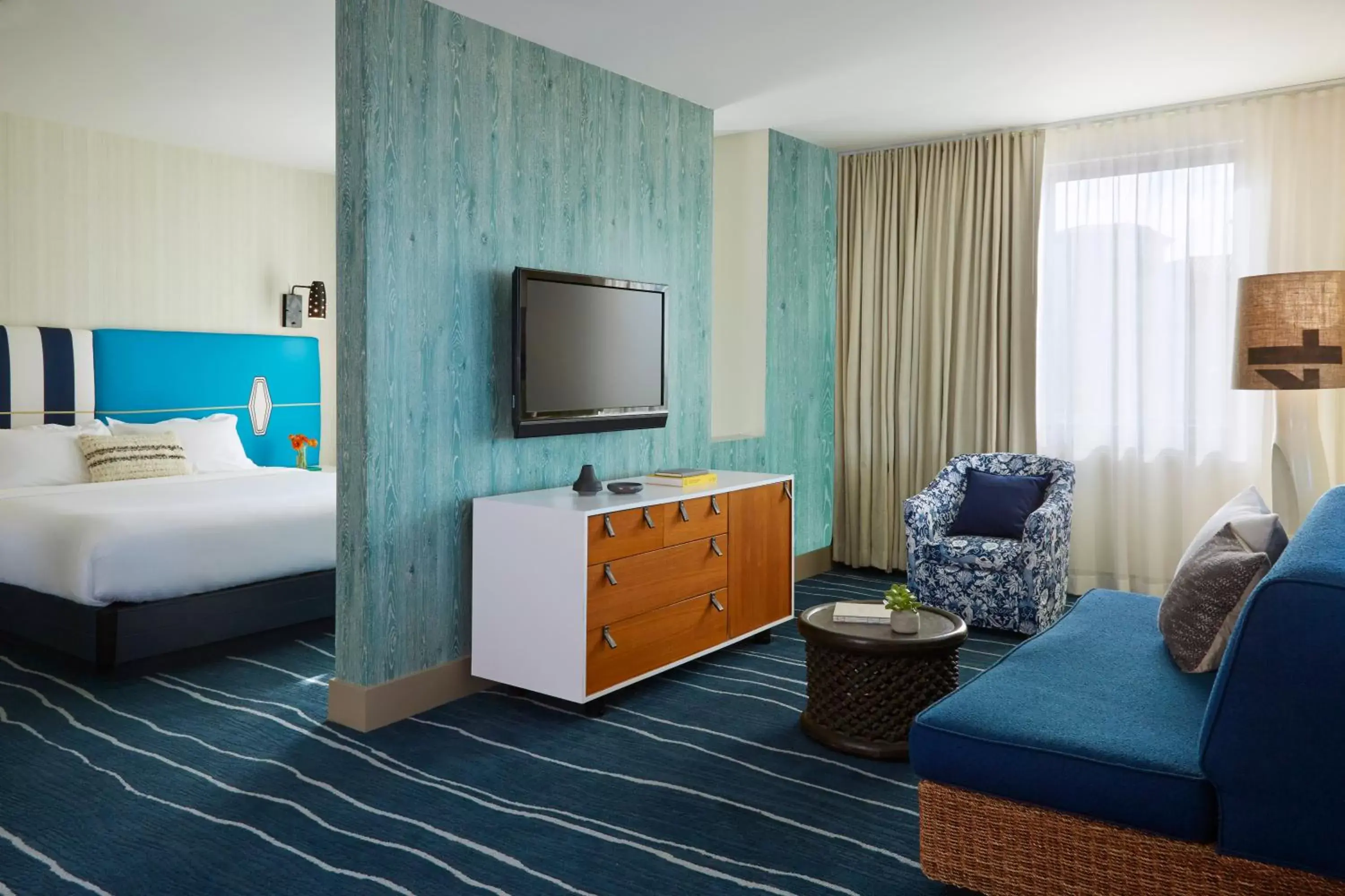 Photo of the whole room, TV/Entertainment Center in Kimpton Shorebreak Huntington Beach Resort, an IHG Hotel