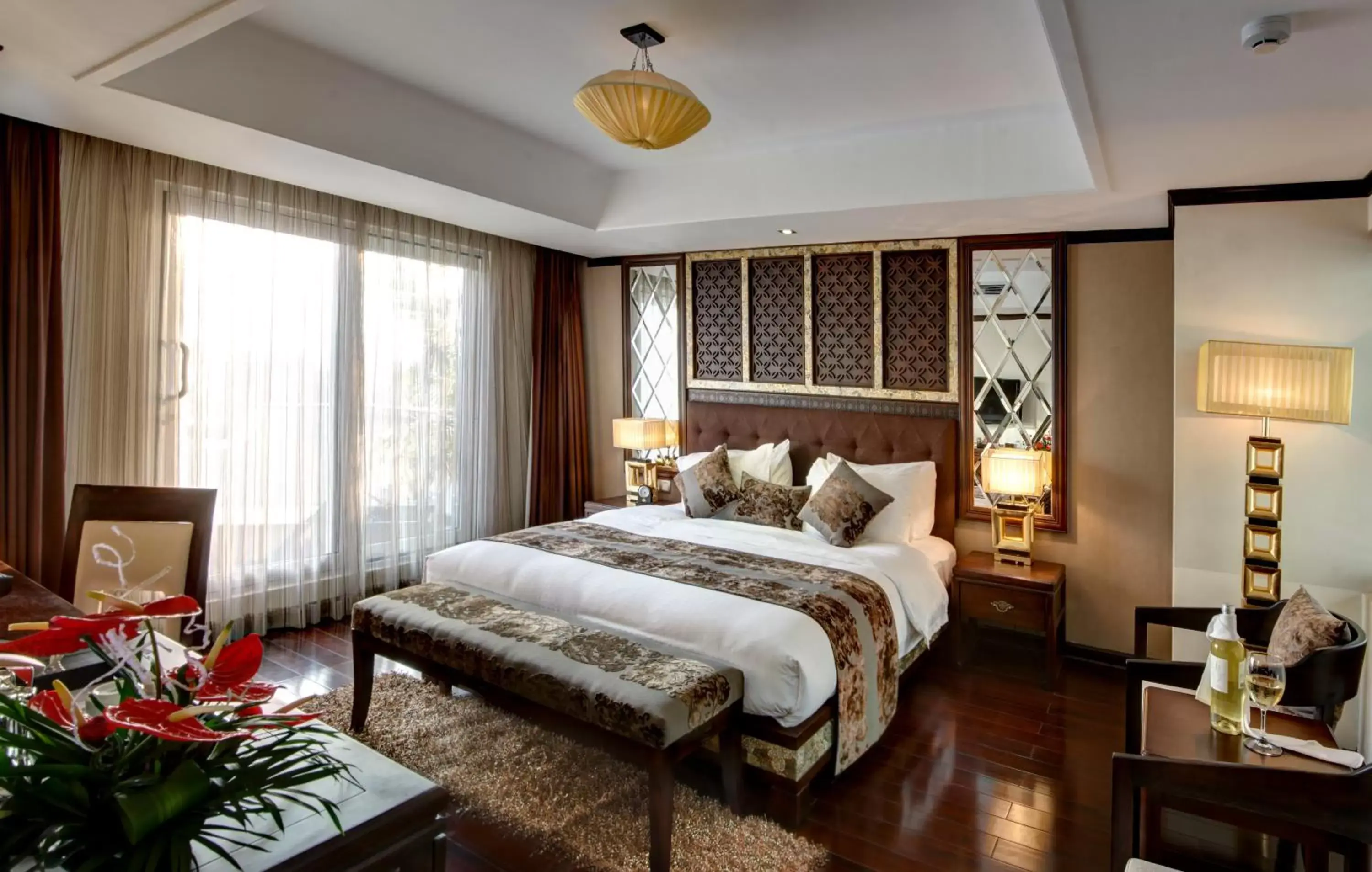 Bed in Golden Lotus Luxury Hotel