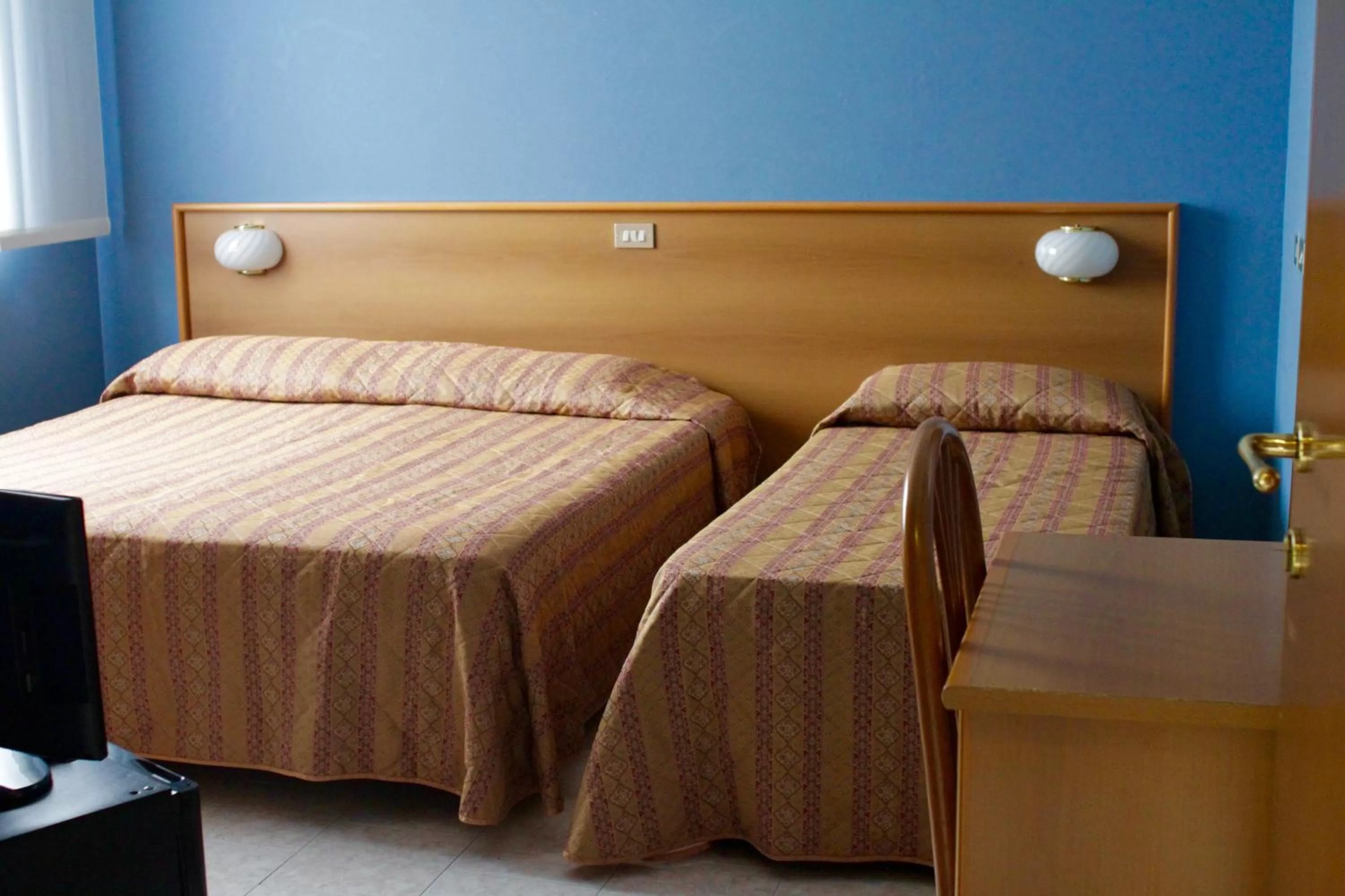 Bed in Hotel Monumento