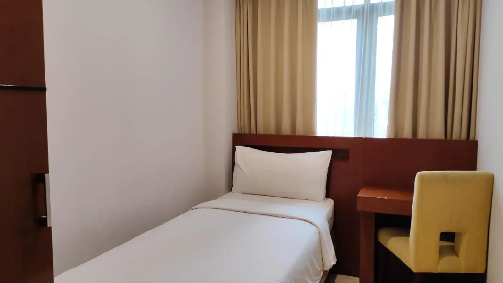 Bed in Grand Kuta Hotel And Residence