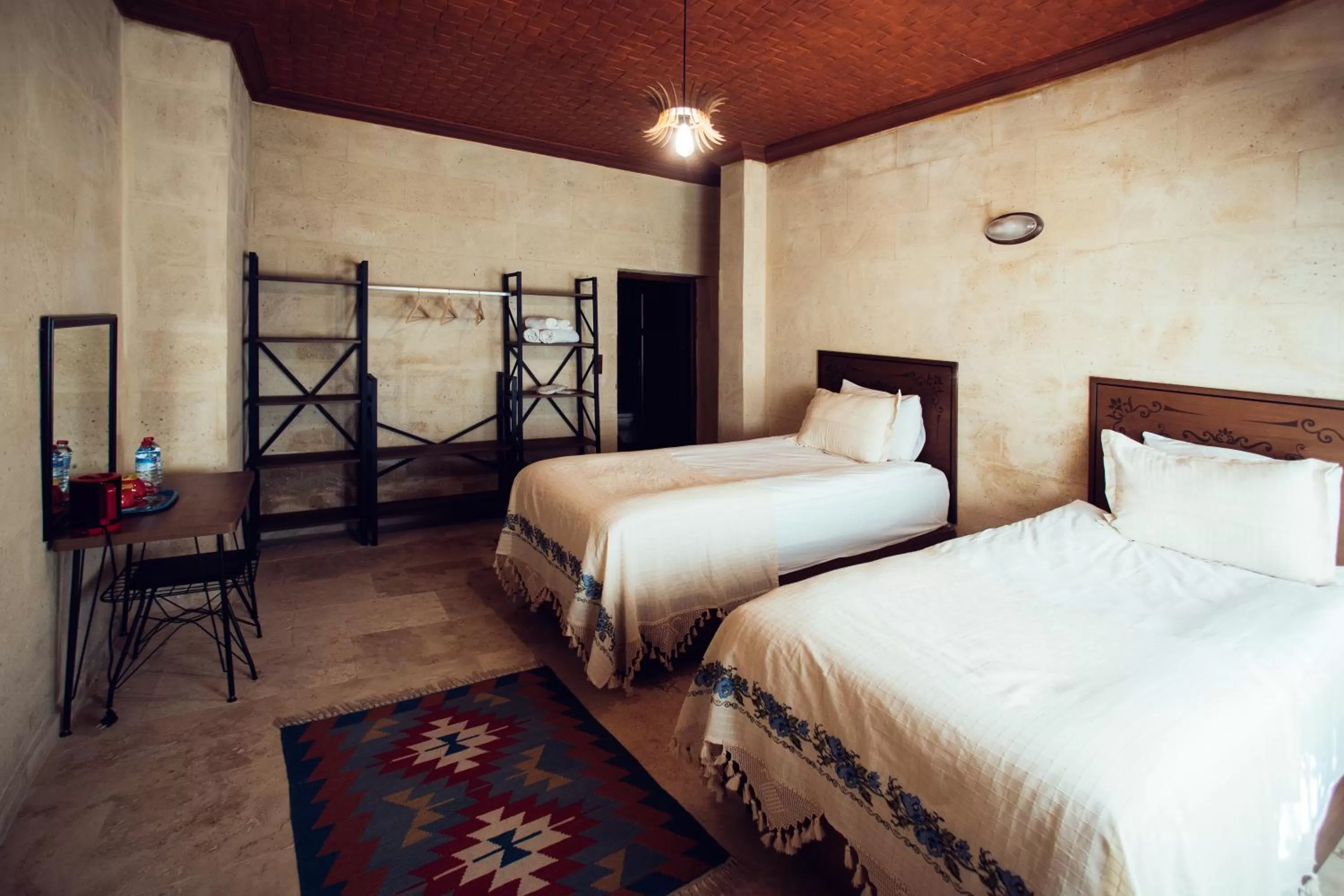 Bed in Azalea Terrace Cave Hotel