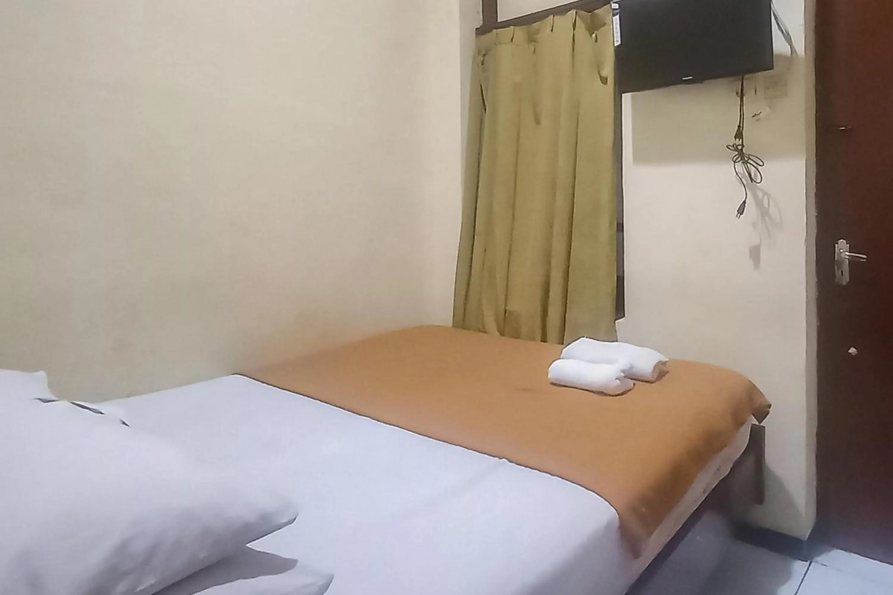 Bed in Hotel Malang near Alun Alun Malang RedPartner