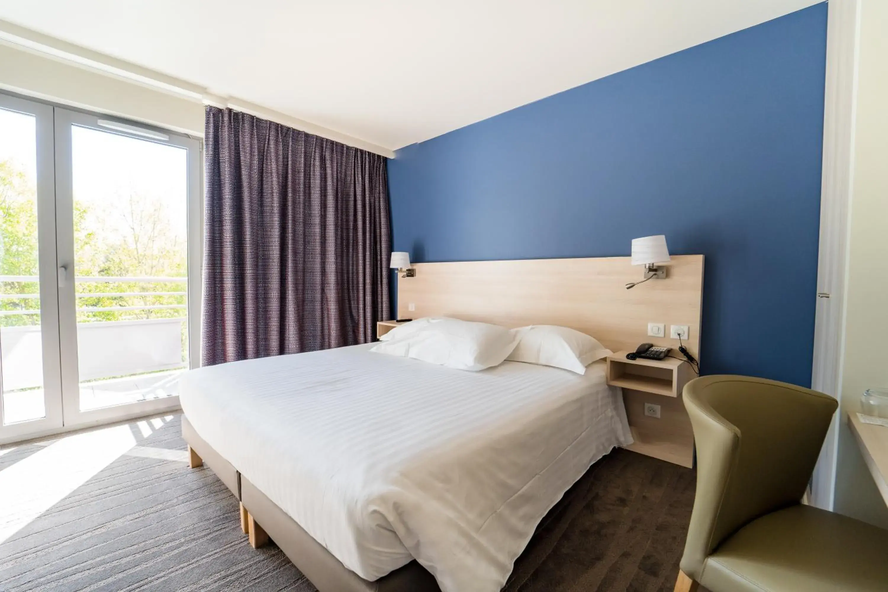 Bed in Relais De La Malmaison Paris Rueil Hotel-Spa