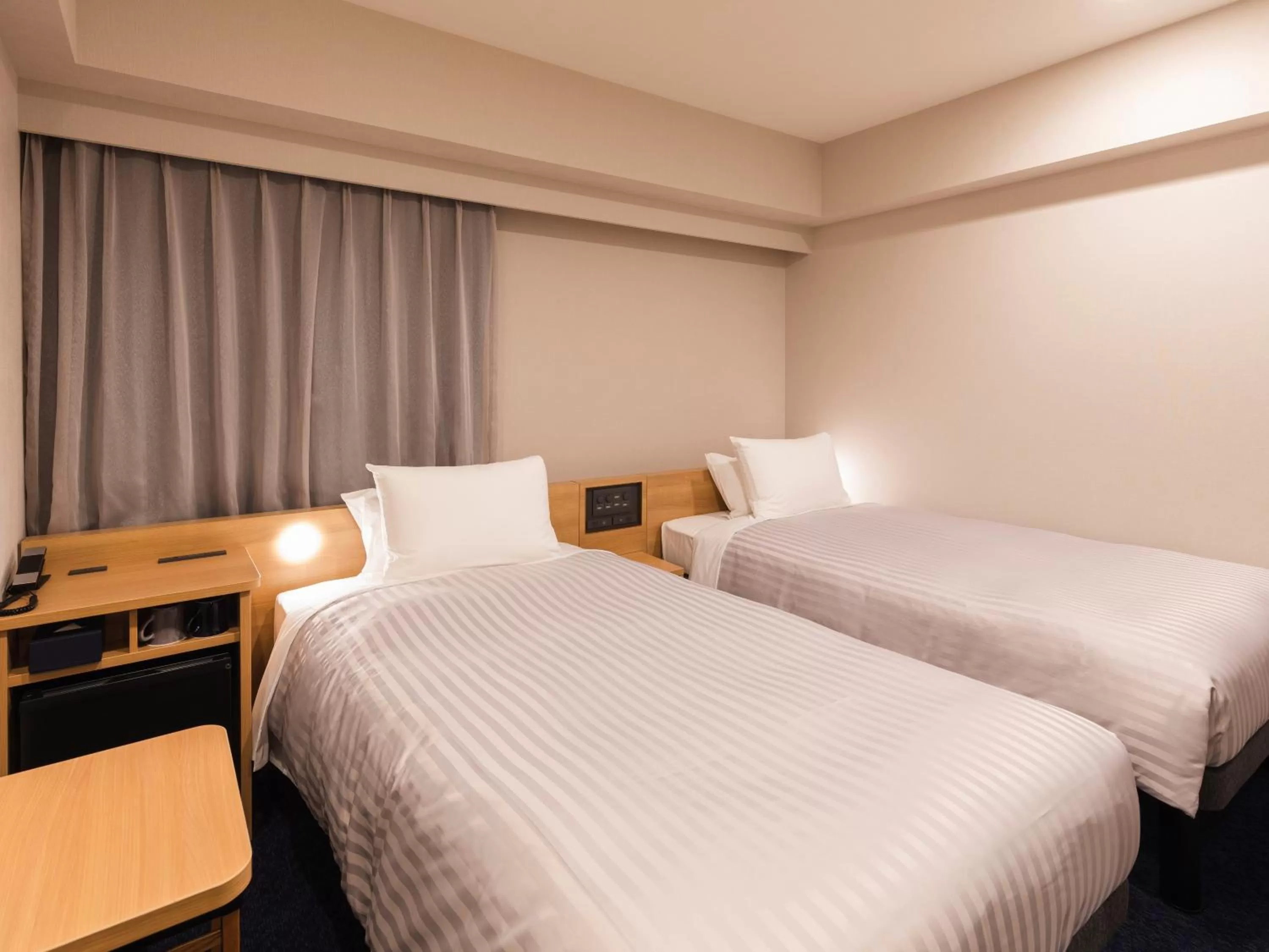 Photo of the whole room, Bed in Sotetsu Fresa Inn Nagoya-Shinkansenguchi