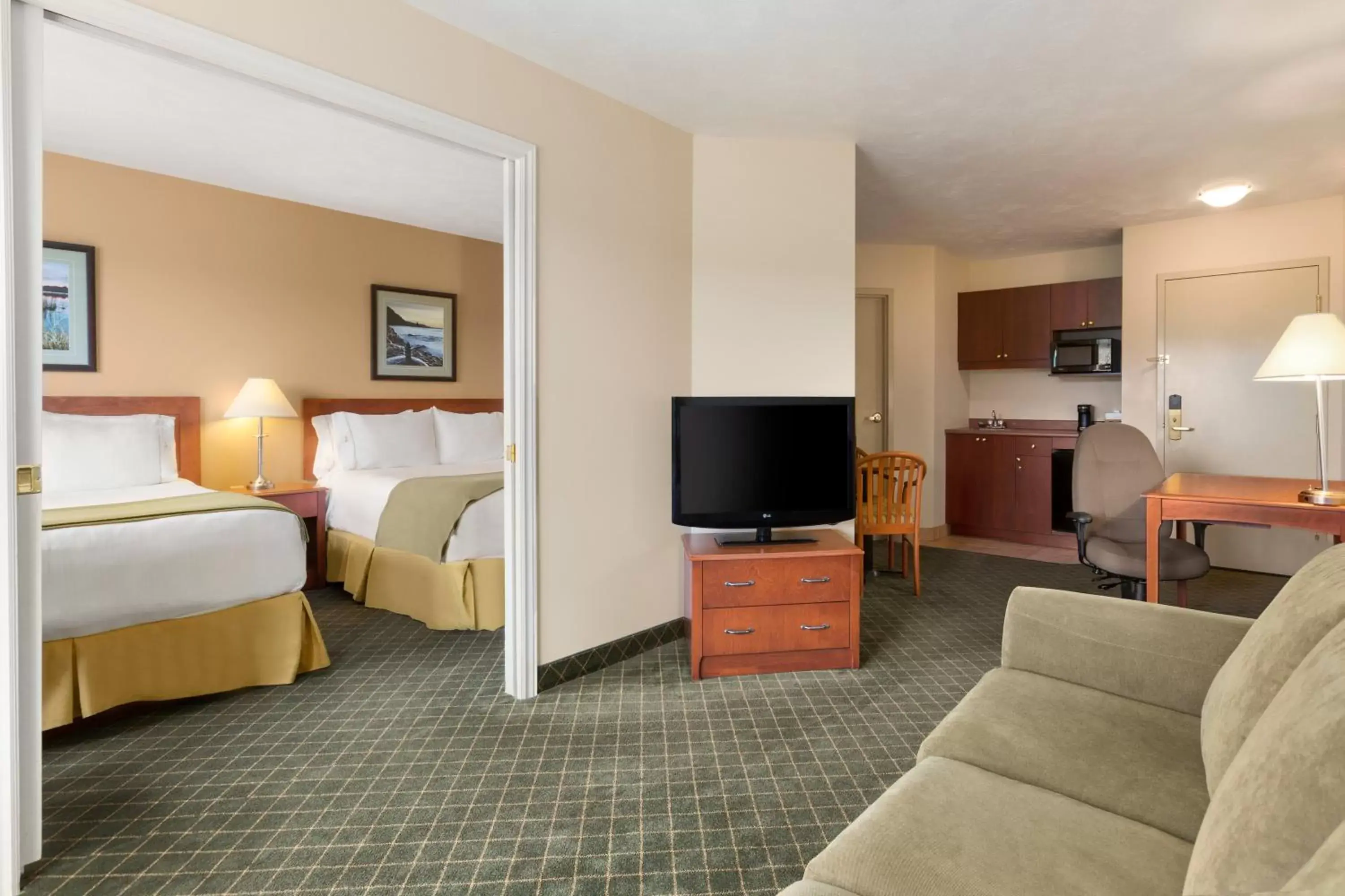 Living room, Room Photo in Days Inn & Suites by Wyndham Moncton