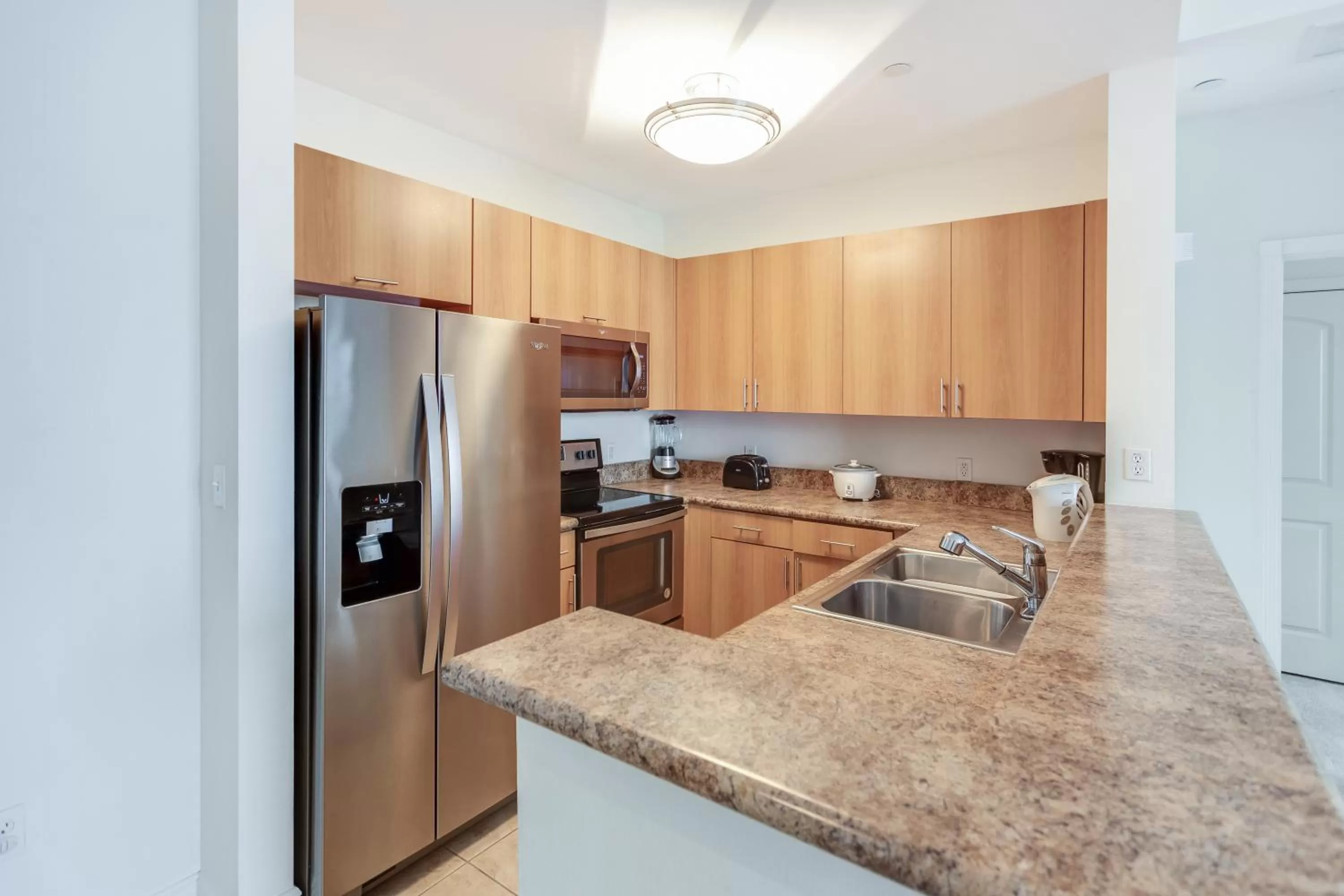 Kitchen or kitchenette in Dadeland Towers by Miami Vacations