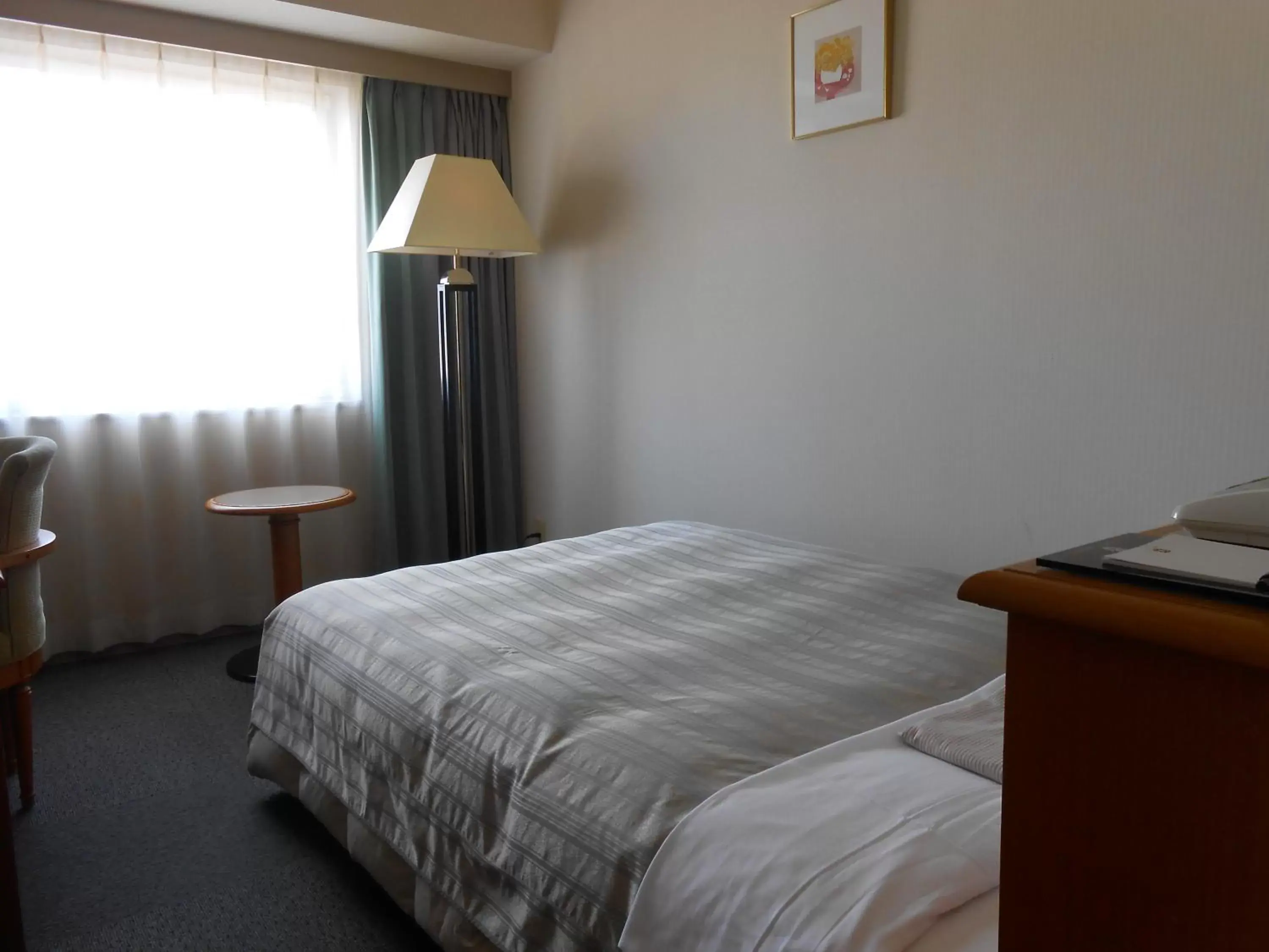 Photo of the whole room, Bed in Hotel Sunroute Niigata