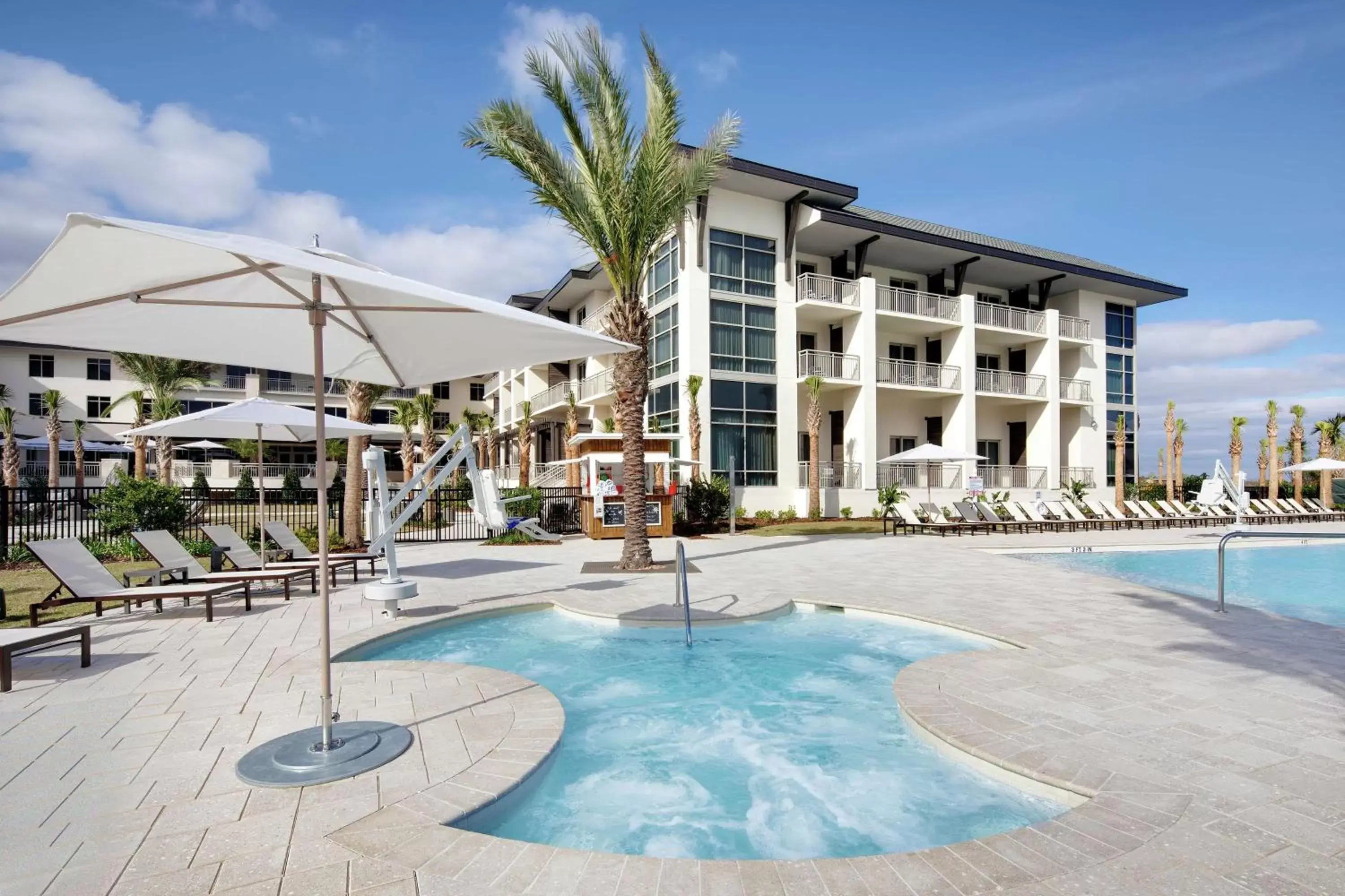 Property building, Swimming Pool in Embassy Suites St Augustine Beach Oceanfront Resort