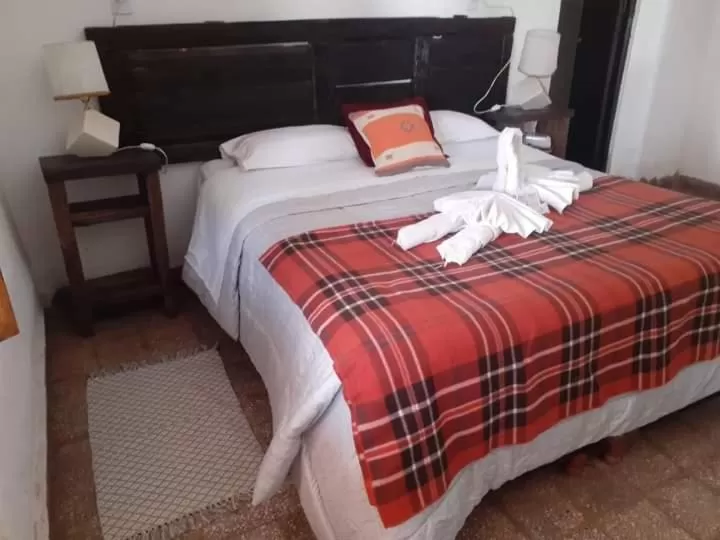 Bed in Hotel Hacienda Casa Blanca