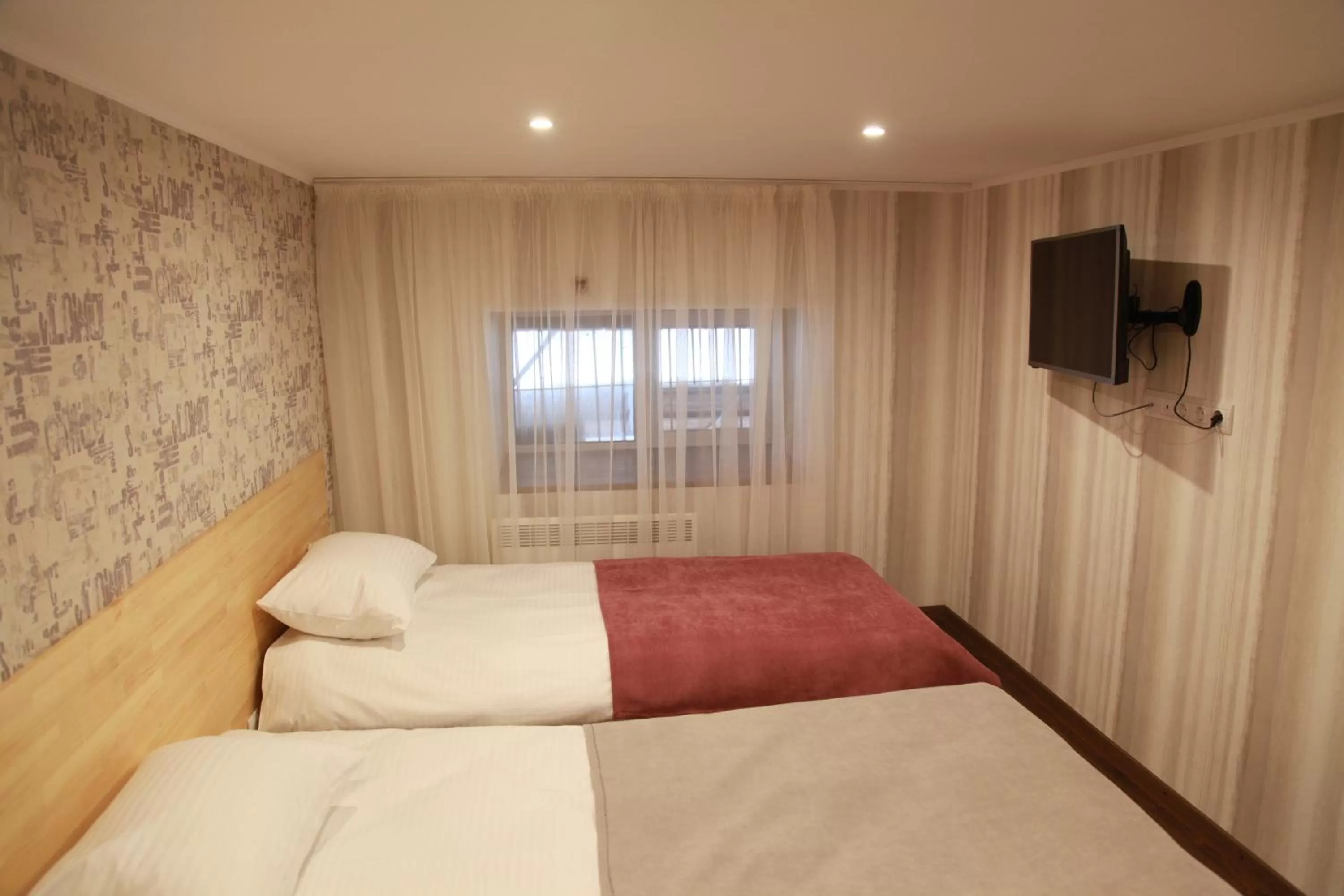 Bed in WINE & ROSE BOUTIQUE HOTEL