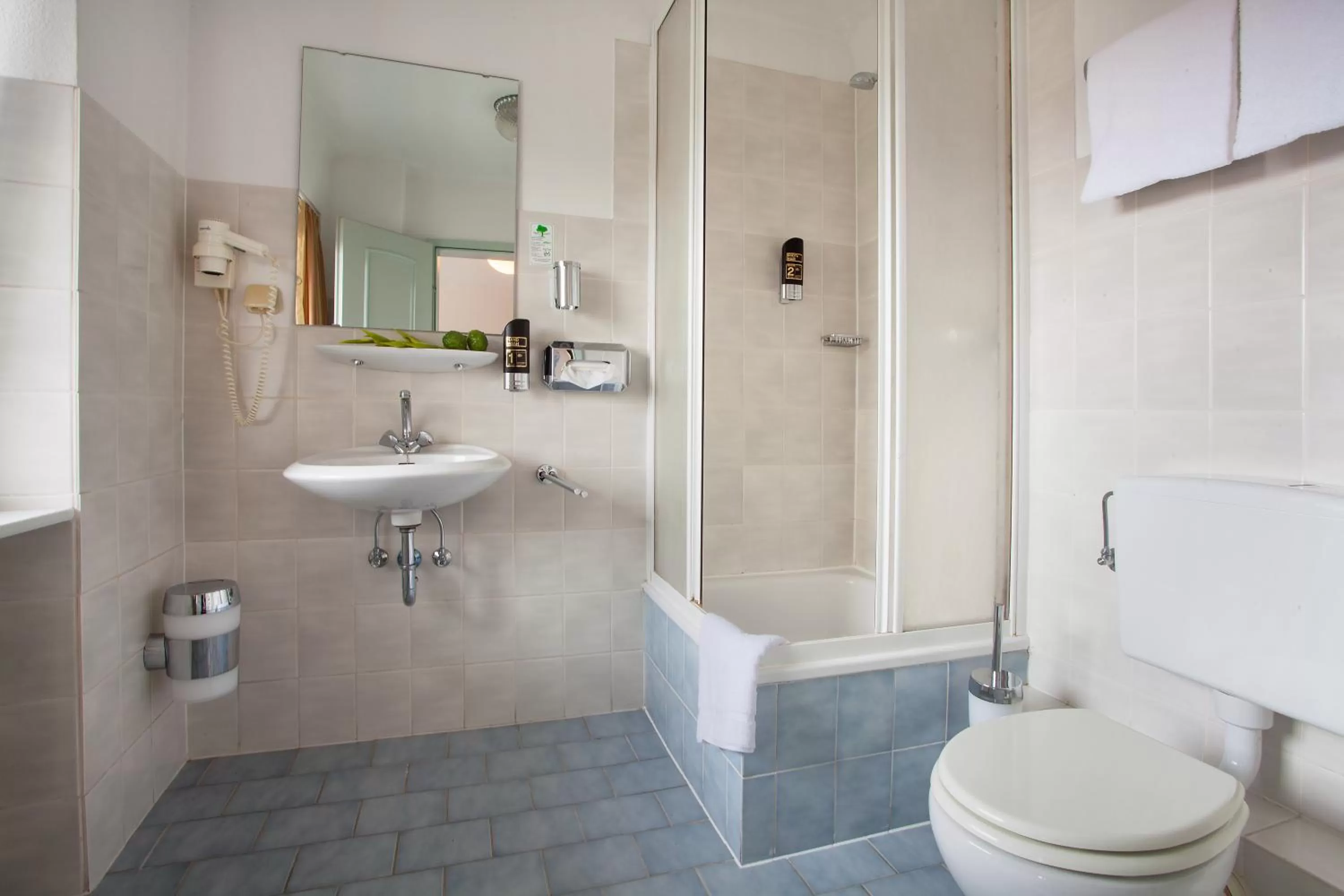 Bathroom in INA Hotel Royal