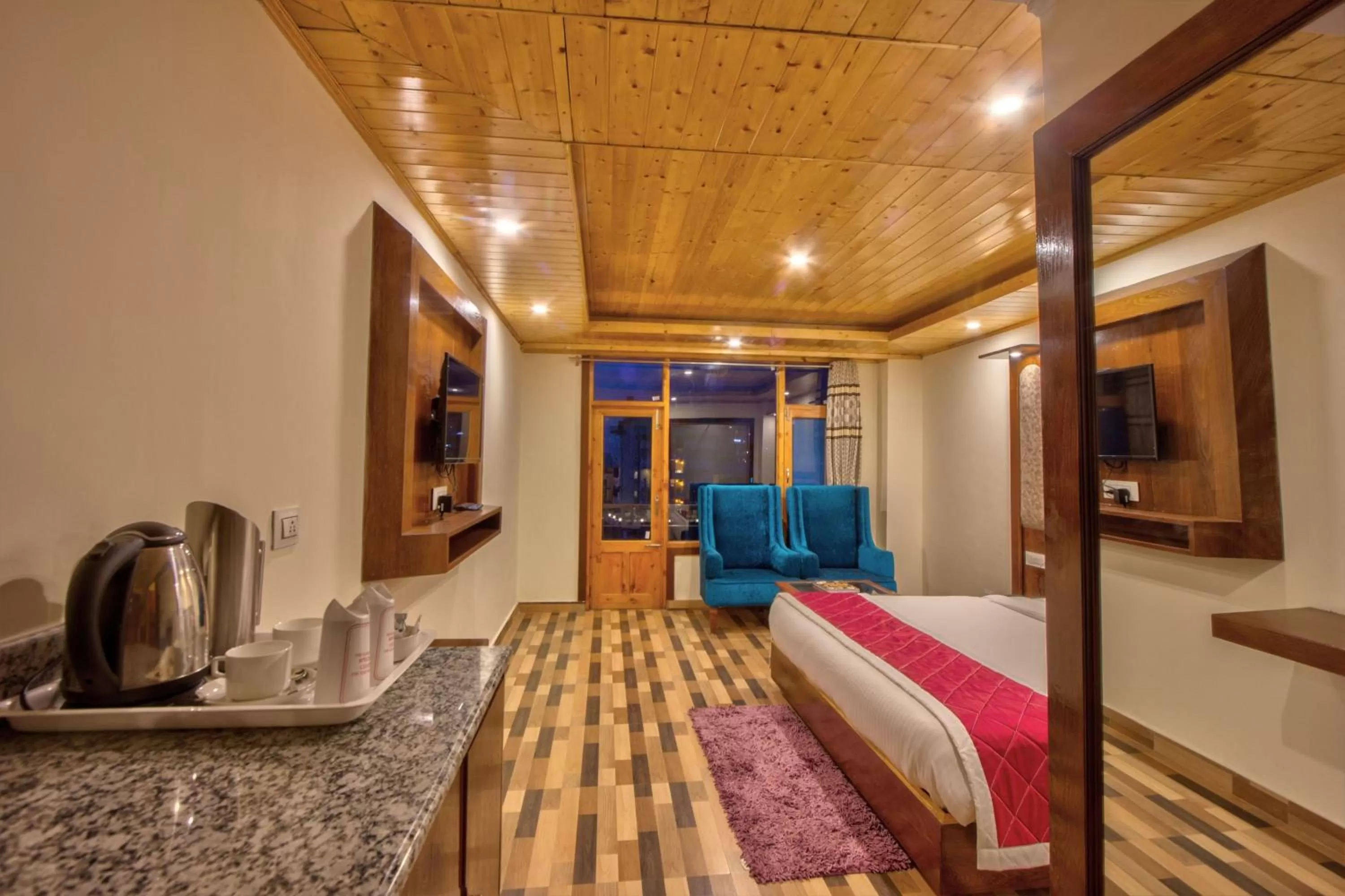 Photo of the whole room, Bed in Snow City's Montana Blues Resort Manali - Heated & Air-Cooled Stay